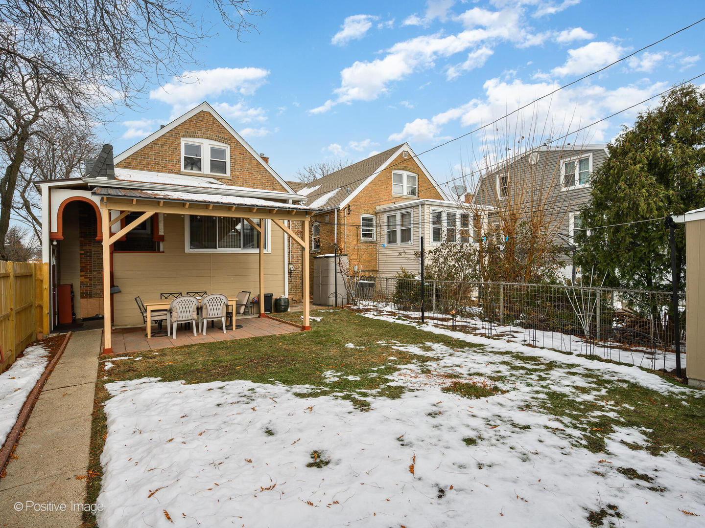6057 West Melrose Street Chicago, IL 60634 - Photo 32 of 32 a front view of a house with a yard