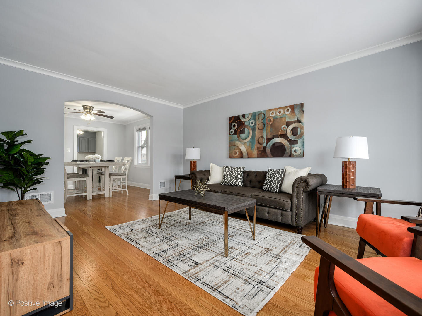 6057 West Melrose Street Chicago, IL 60634 - Photo 4 of 32 a living room with furniture and wooden floor