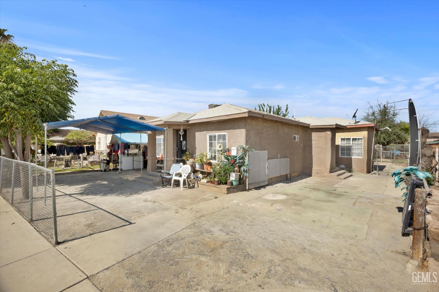 Undisclosed Address Delano, CA 93215 - Photo 28 of 43 a view of a house with sitting area and garden
