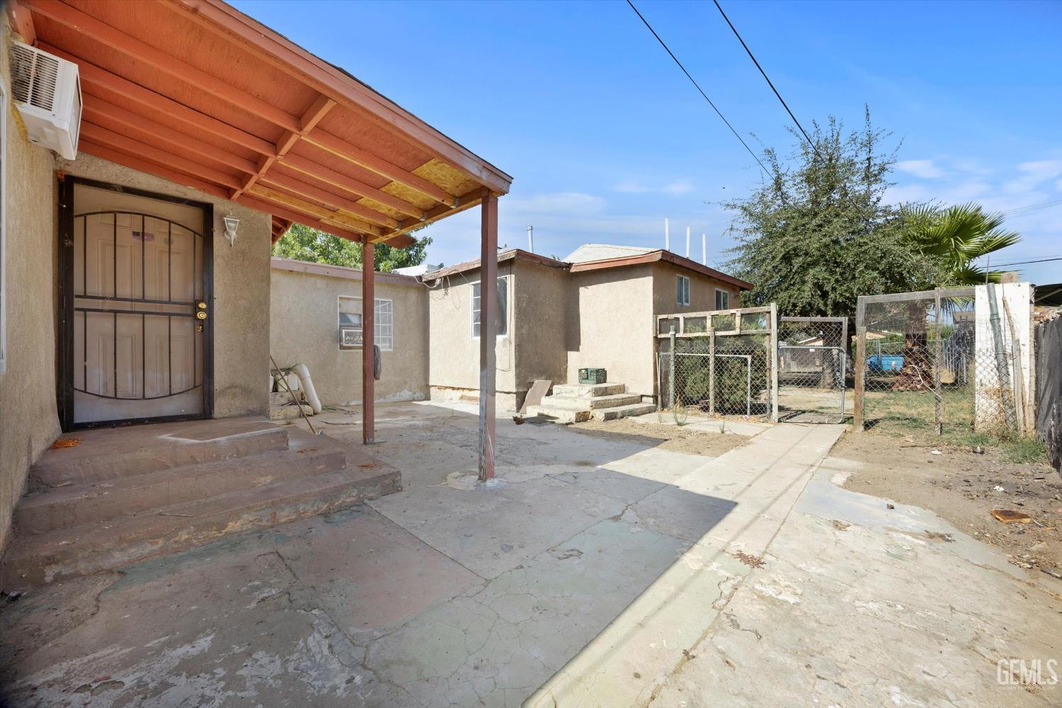 Undisclosed Address Delano, CA 93215 - Photo 30 of 43 a view of a house with backyard and sitting area