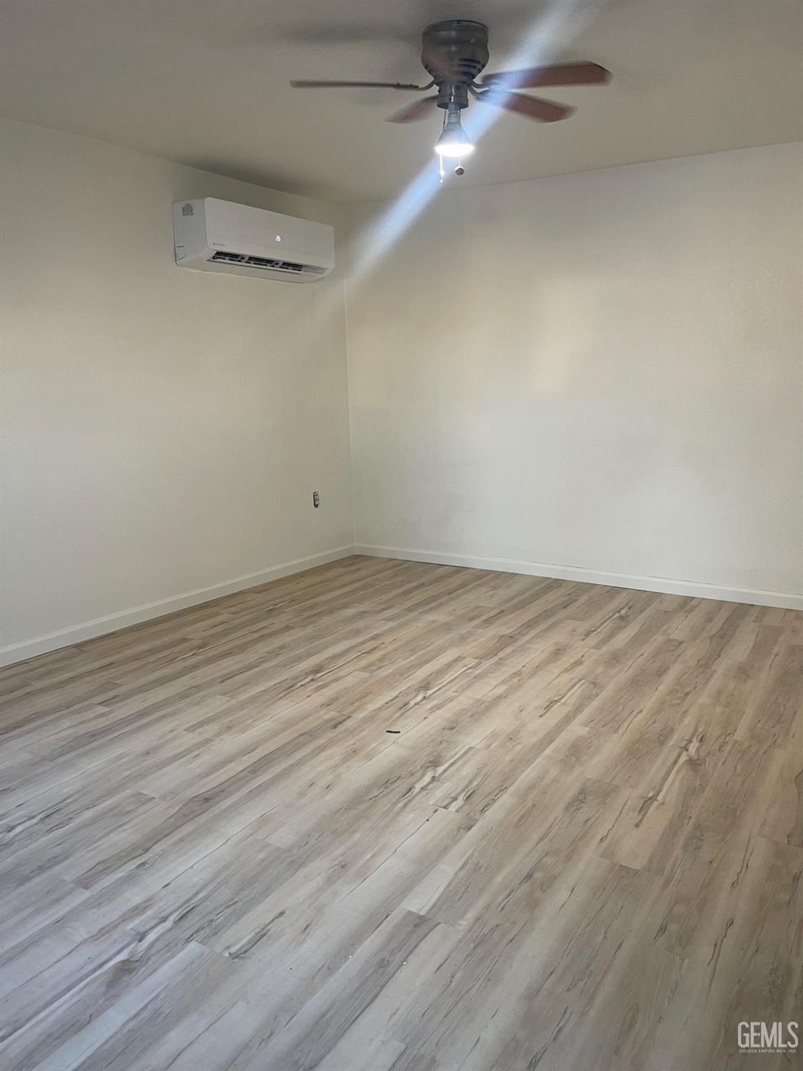 Undisclosed Address Delano, CA 93215 - Photo 39 of 43 wooden floor in a empty room