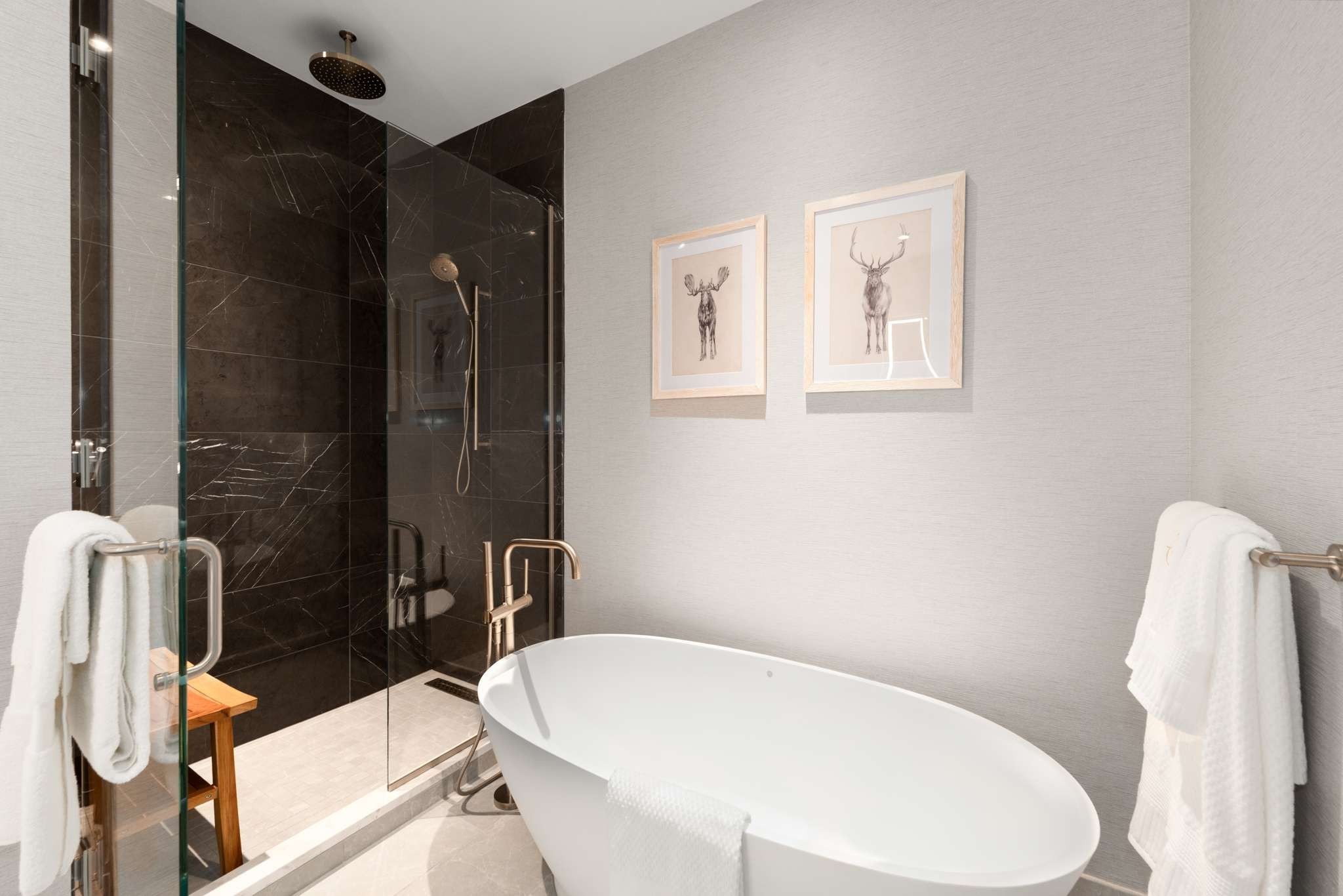 160 2nd Avenue South, Unit 1902 Nashville, TN 37201 - Photo 17 of 40 a white toilet sitting next to a bathroom sink and tub