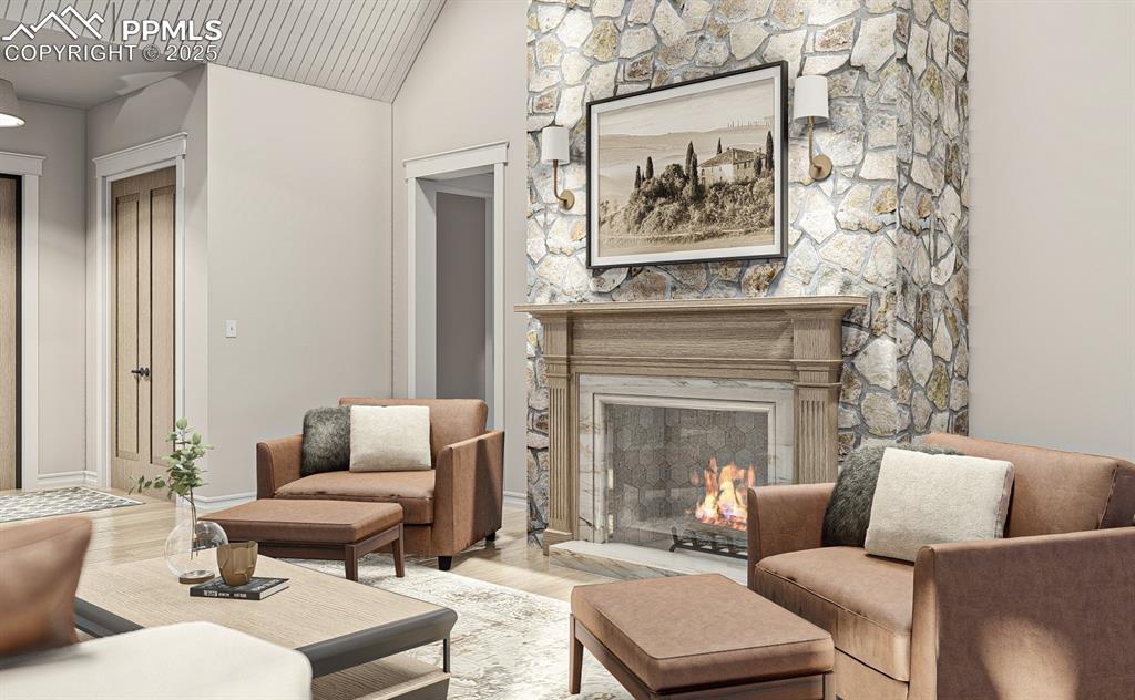 11809 Flap Jack Lane Colorado Springs, CO 80908 - Photo 12 of 18 a living room with furniture and a fireplace