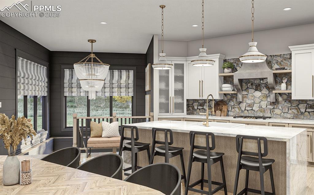 11809 Flap Jack Lane Colorado Springs, CO 80908 - Photo 16 of 18 a large kitchen with a table and chairs