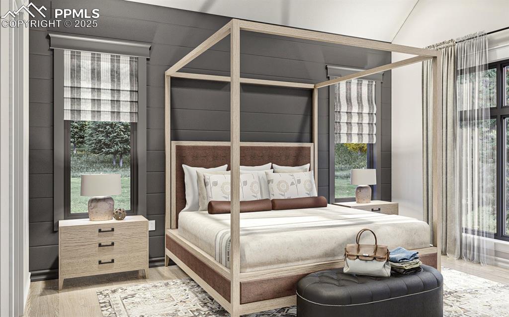 11809 Flap Jack Lane Colorado Springs, CO 80908 - Photo 17 of 18 a bedroom with a bed and a large window