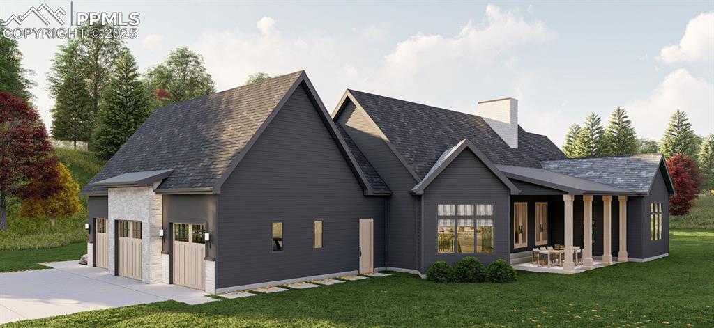 11809 Flap Jack Lane Colorado Springs, CO 80908 - Photo 4 of 18 a front view of a house with a yard