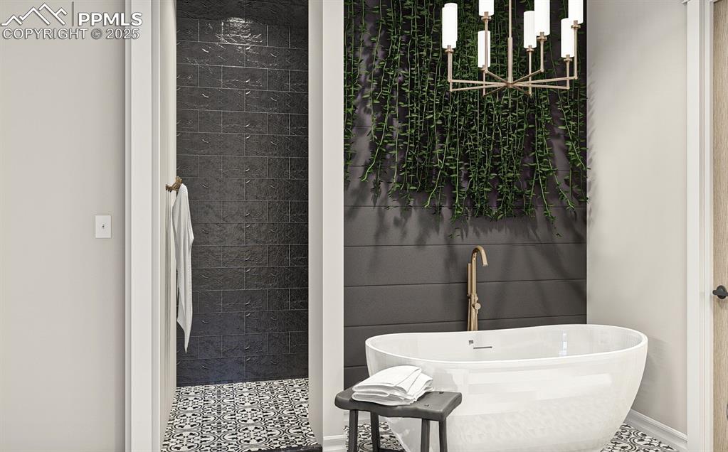 11809 Flap Jack Lane Colorado Springs, CO 80908 - Photo 8 of 18 a bathroom with a sink a toilet a shower and bathtub