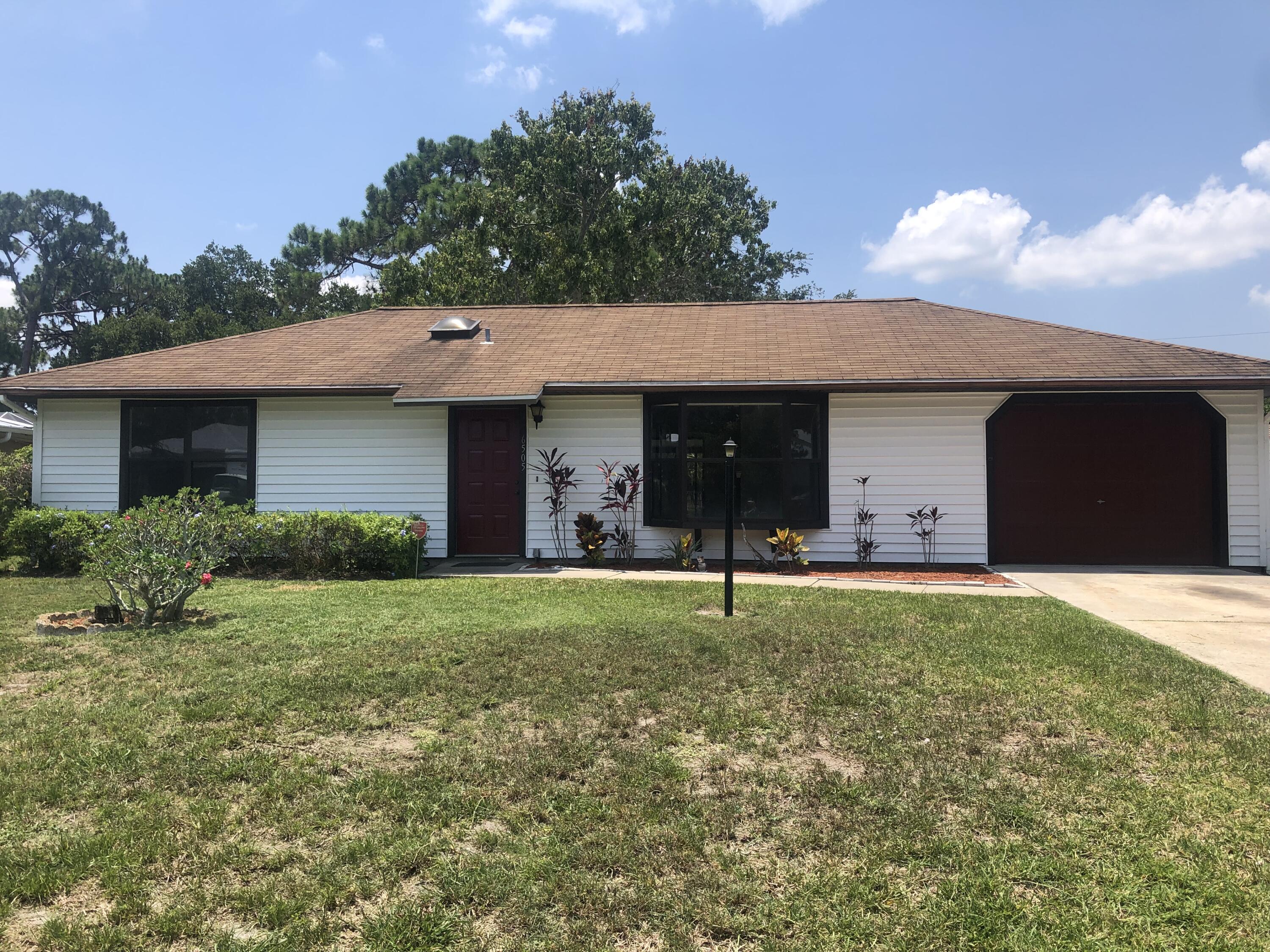 6505 Bayard Road Fort Pierce, FL 34951 - Photo 1 of 26 Front