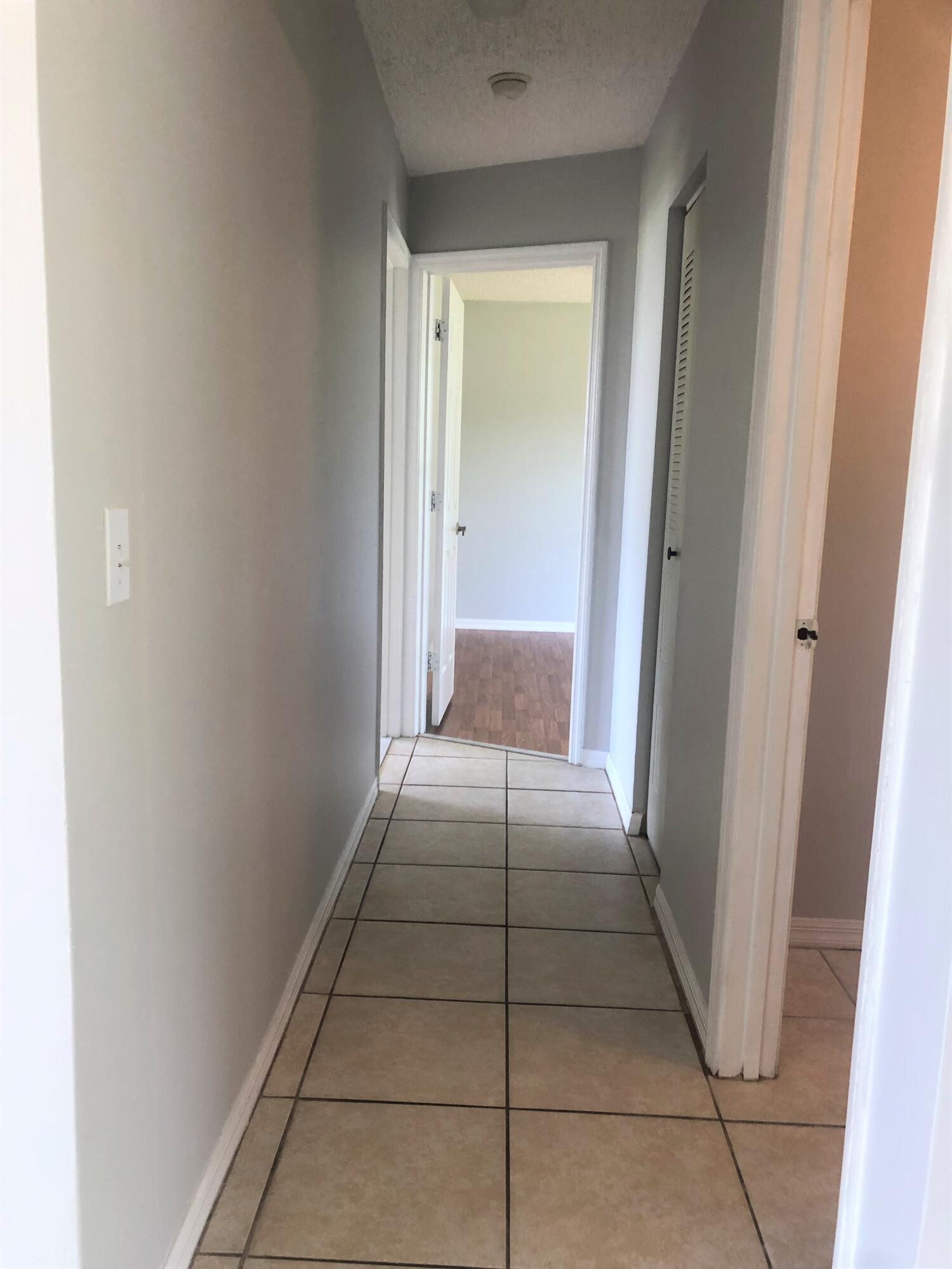 6505 Bayard Road Fort Pierce, FL 34951 - Photo 10 of 26 Hallway to bedrooms