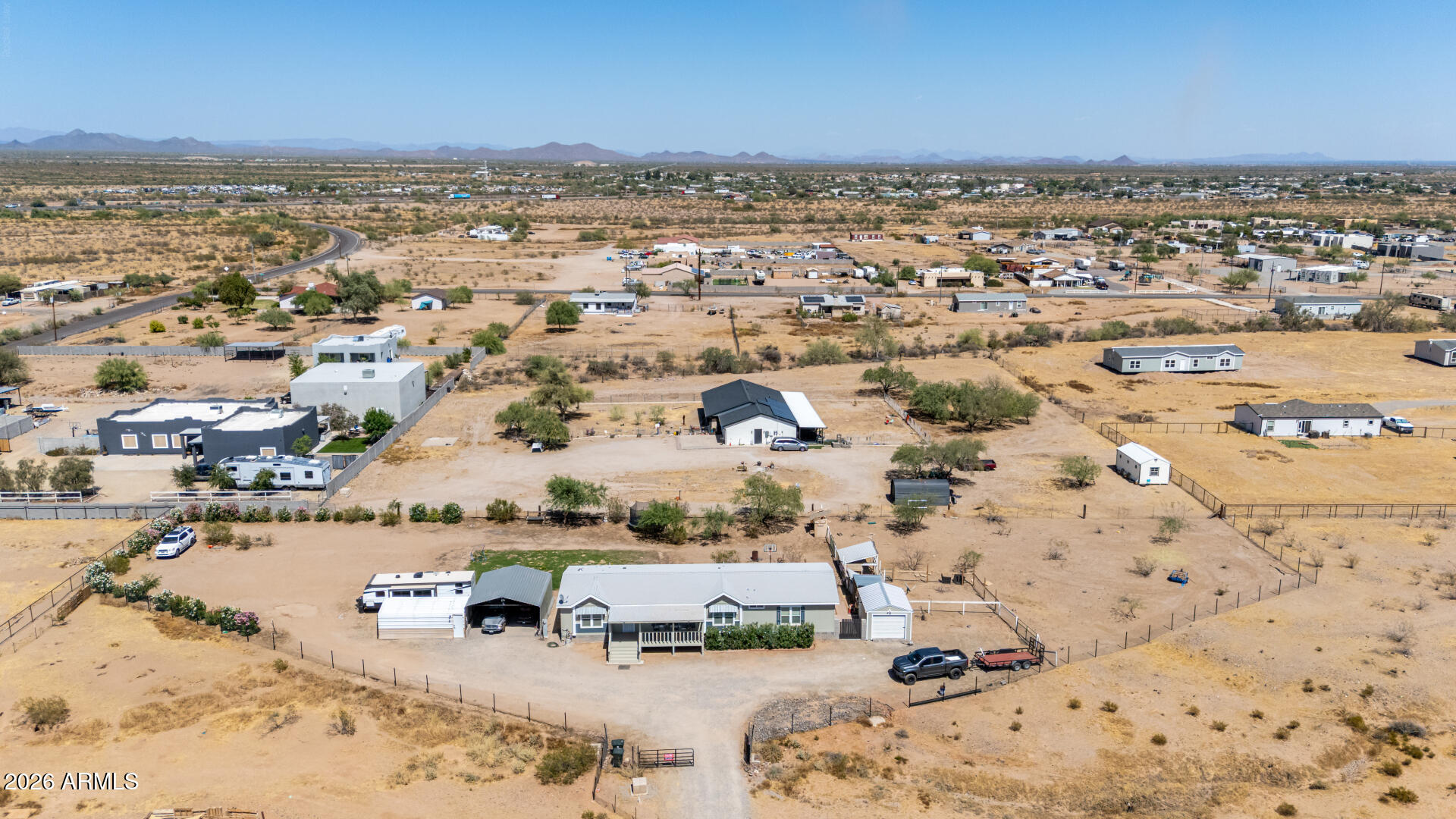 22417 West Dove Valley Road Wittmann, AZ 85361 - Photo 50 of 53 an aerial view of residential building and parking space
