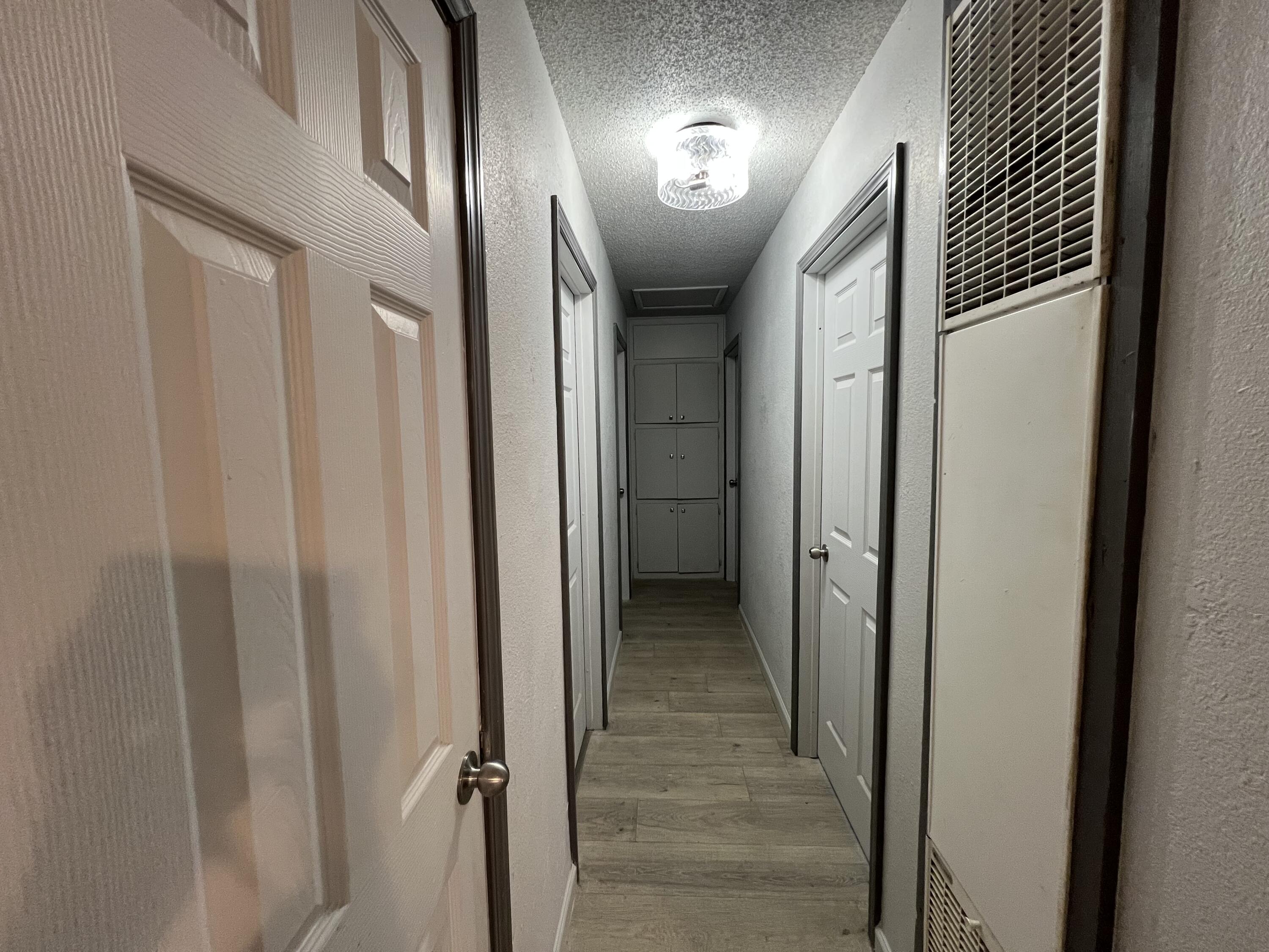 801 Vanda Avenue Lubbock, TX 79403 - Photo 9 of 13 a view of a hallway