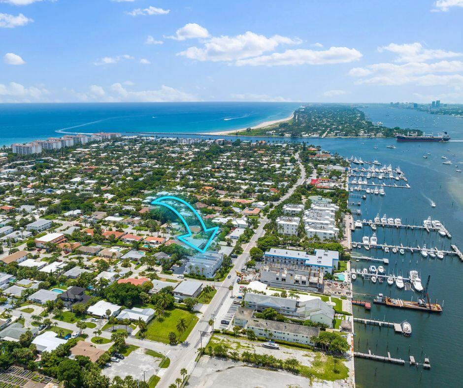 1101 Beach Road, Unit C Palm Beach Shores, FL 33404 - Photo 1 of 44 a view of a city with tall buildings