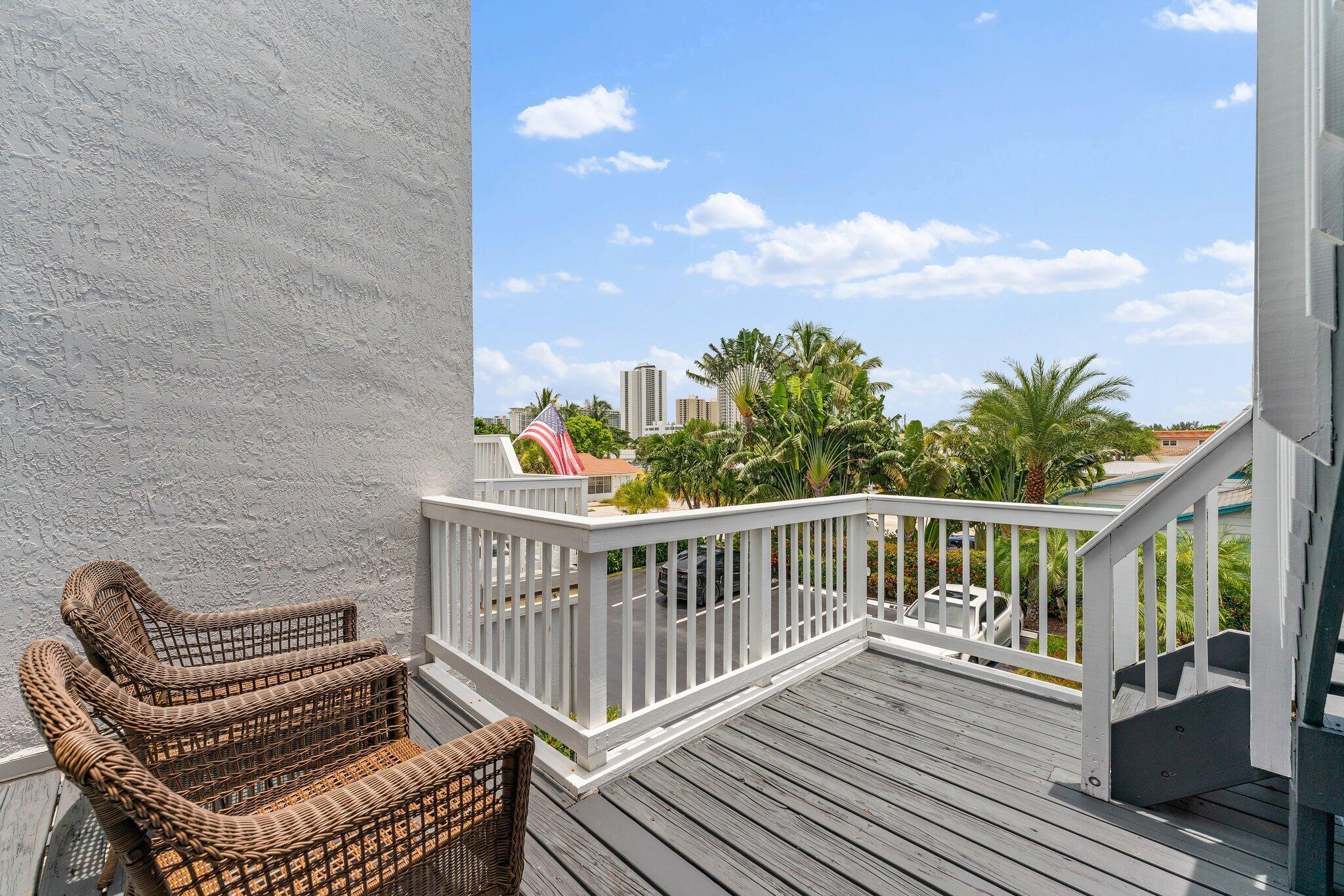 1101 Beach Road, Unit C Palm Beach Shores, FL 33404 - Photo 35 of 44 a view of balcony with wooden floor