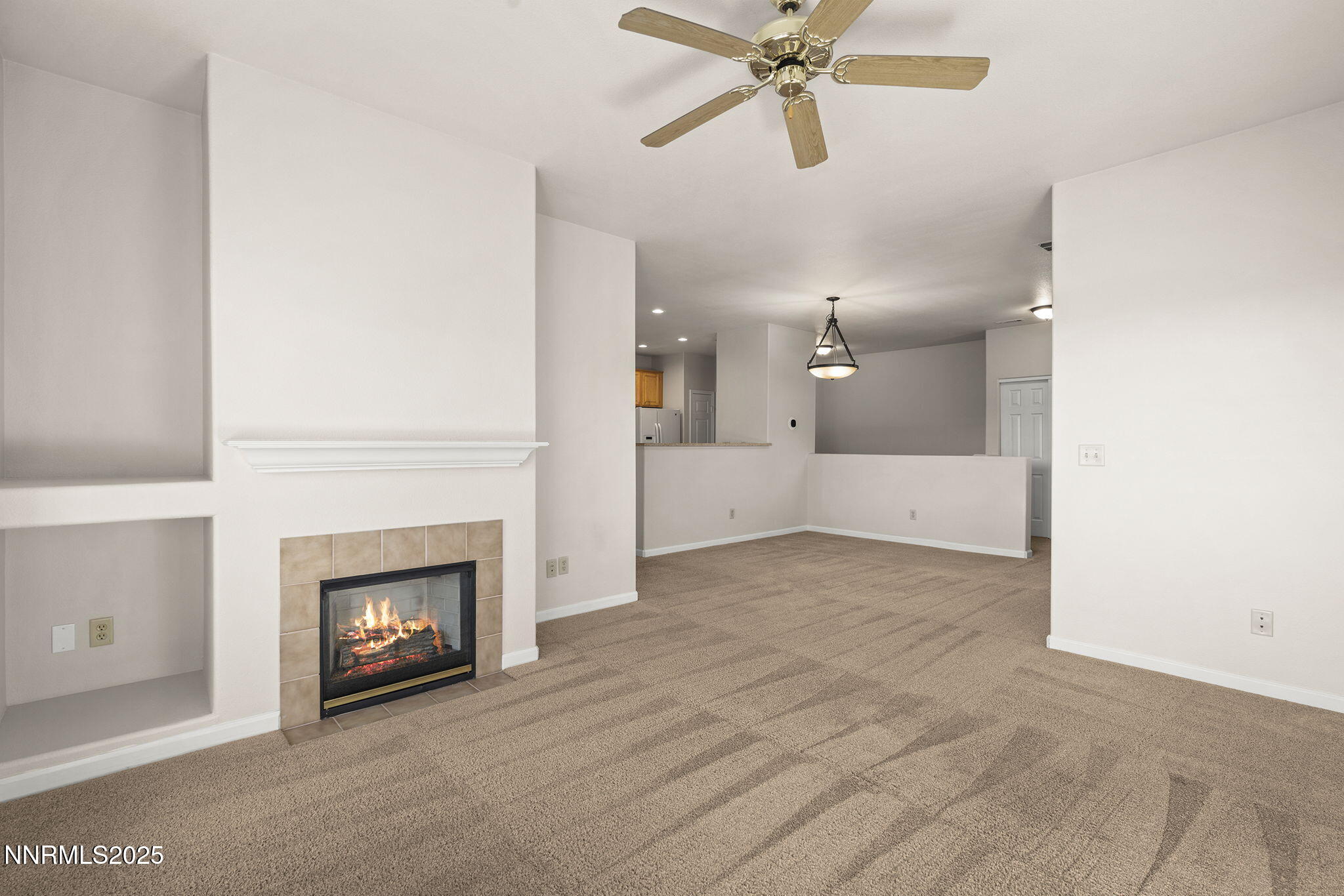 900 South Meadows Parkway, Unit 4321 Reno, NV 89521 - Photo 12 of 40 a view of an empty room and fire place
