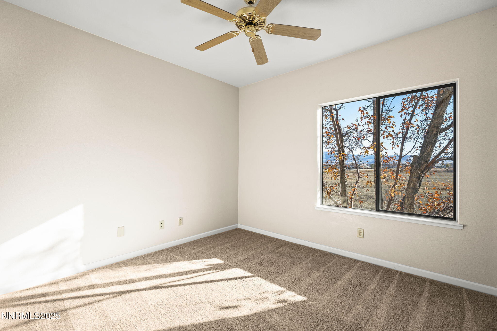 900 South Meadows Parkway, Unit 4321 Reno, NV 89521 - Photo 18 of 40 a view of an empty room with a window