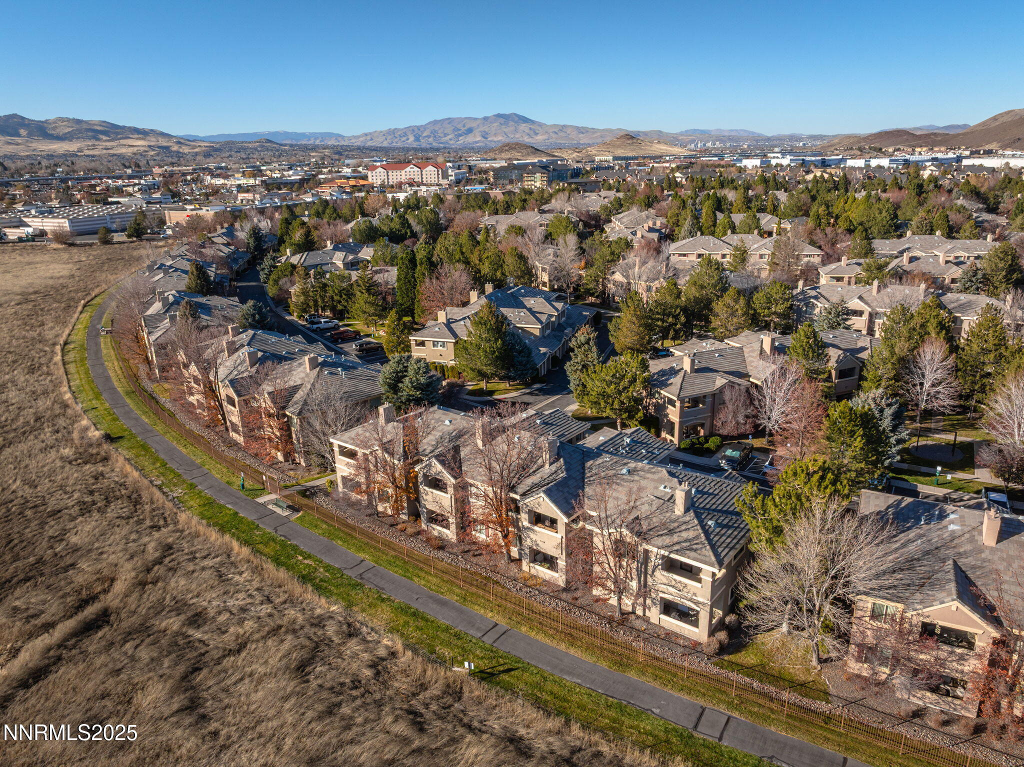 900 South Meadows Parkway, Unit 4321 Reno, NV 89521 - Photo 23 of 40 an aerial view of residential houses with outdoor space