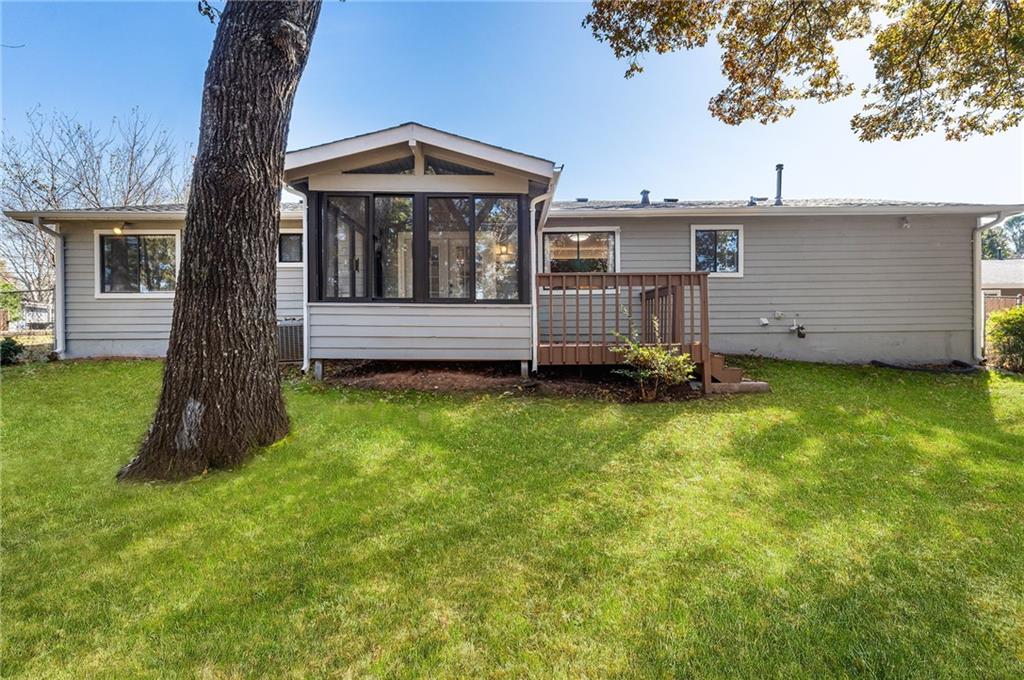 130 Forrest View Terrace Johns Creek, GA 30022 - Photo 30 of 34 a front view of a house with a garden