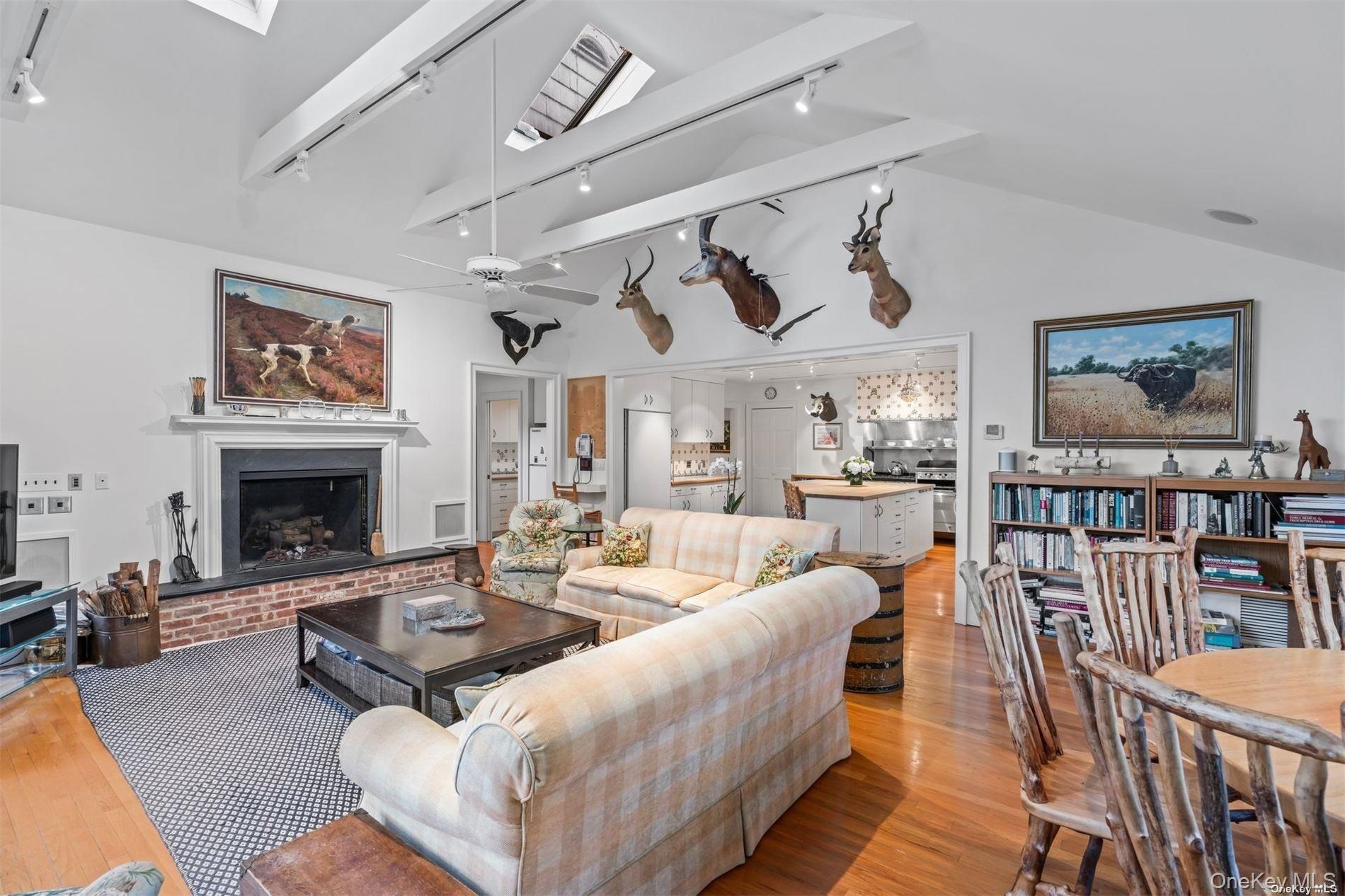 200 Cleft Road Mill Neck, NY 11765 - Photo 15 of 36 Family Room with Fireplace, Breakfast Area and Water Views