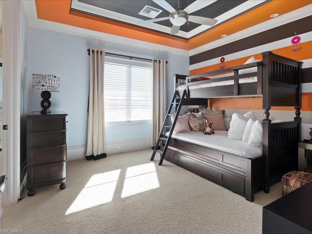 1550 Mullet Lane Naples, FL 34102 - Photo 45 of 50 a bedroom with furniture and a window