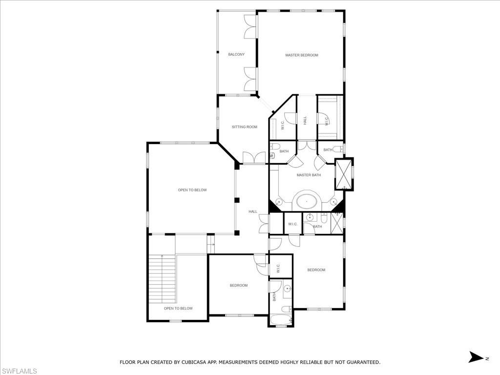 1550 Mullet Lane Naples, FL 34102 - Photo 50 of 50 a picture of a bathroom with a white wall and a picture of it