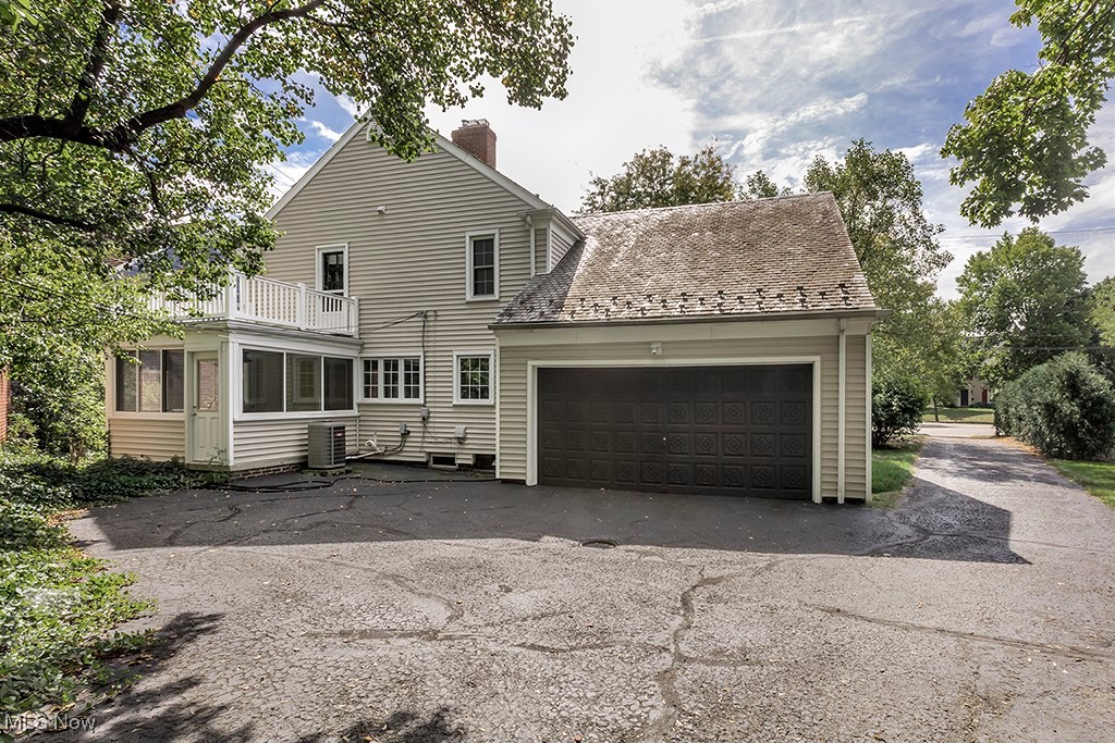 14711 South Woodland Road Cleveland, OH 44120 - Photo 30 of 31 A Rear-Entry Double Two-Car Garage has Space to Turn Around a Car or Provide Visitor Parking.
