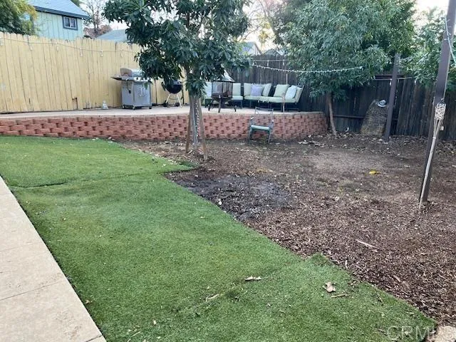a view of a backyard with a trees