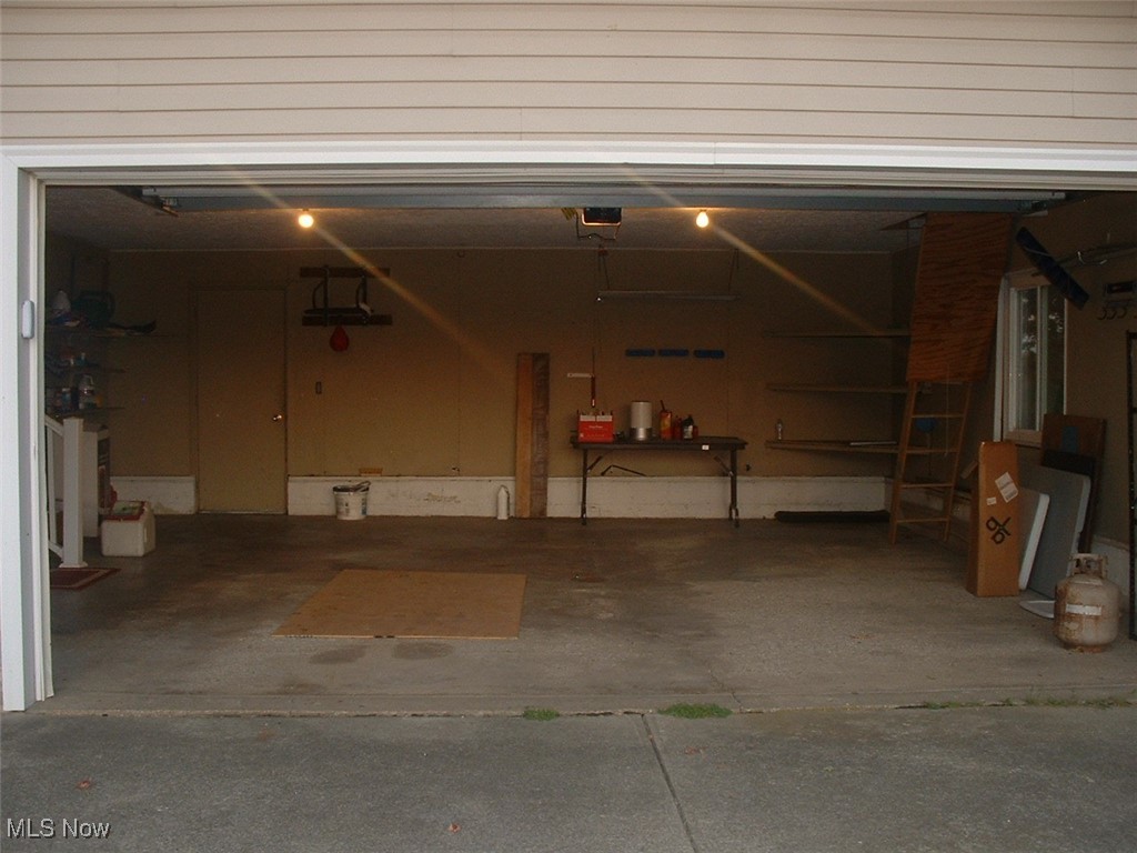 14599 Eby Road Seville, OH 44273 - Photo 23 of 31 View of attached 2 car garage. Has 2 man doors
