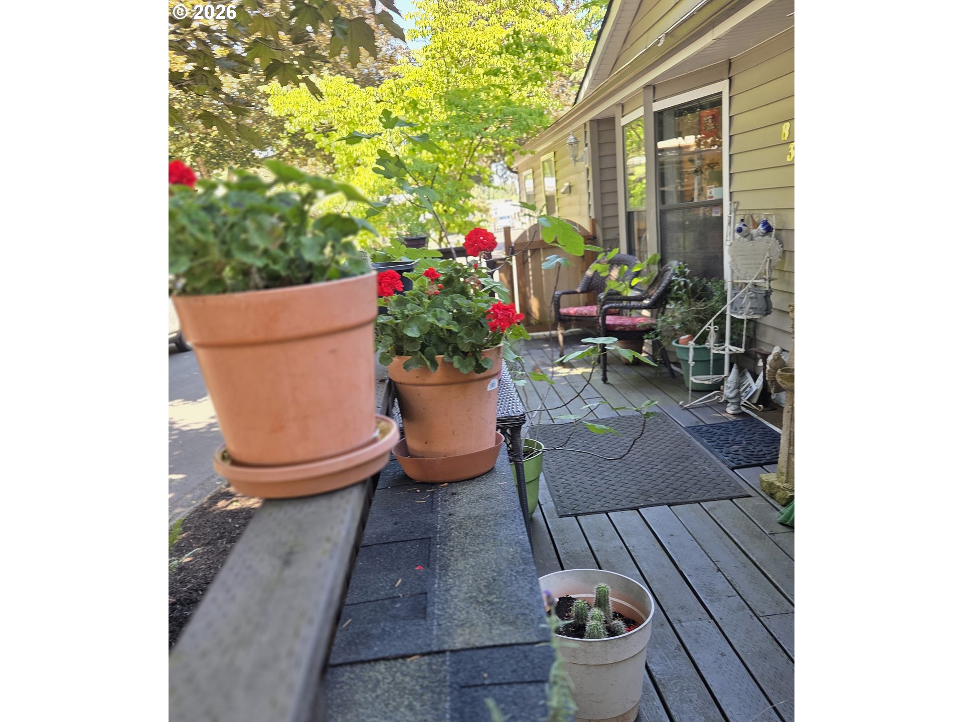 1475 Green Acres Road, Unit 83 Eugene, OR 97408 - Photo 36 of 37 a view of a chairs and table in a patio