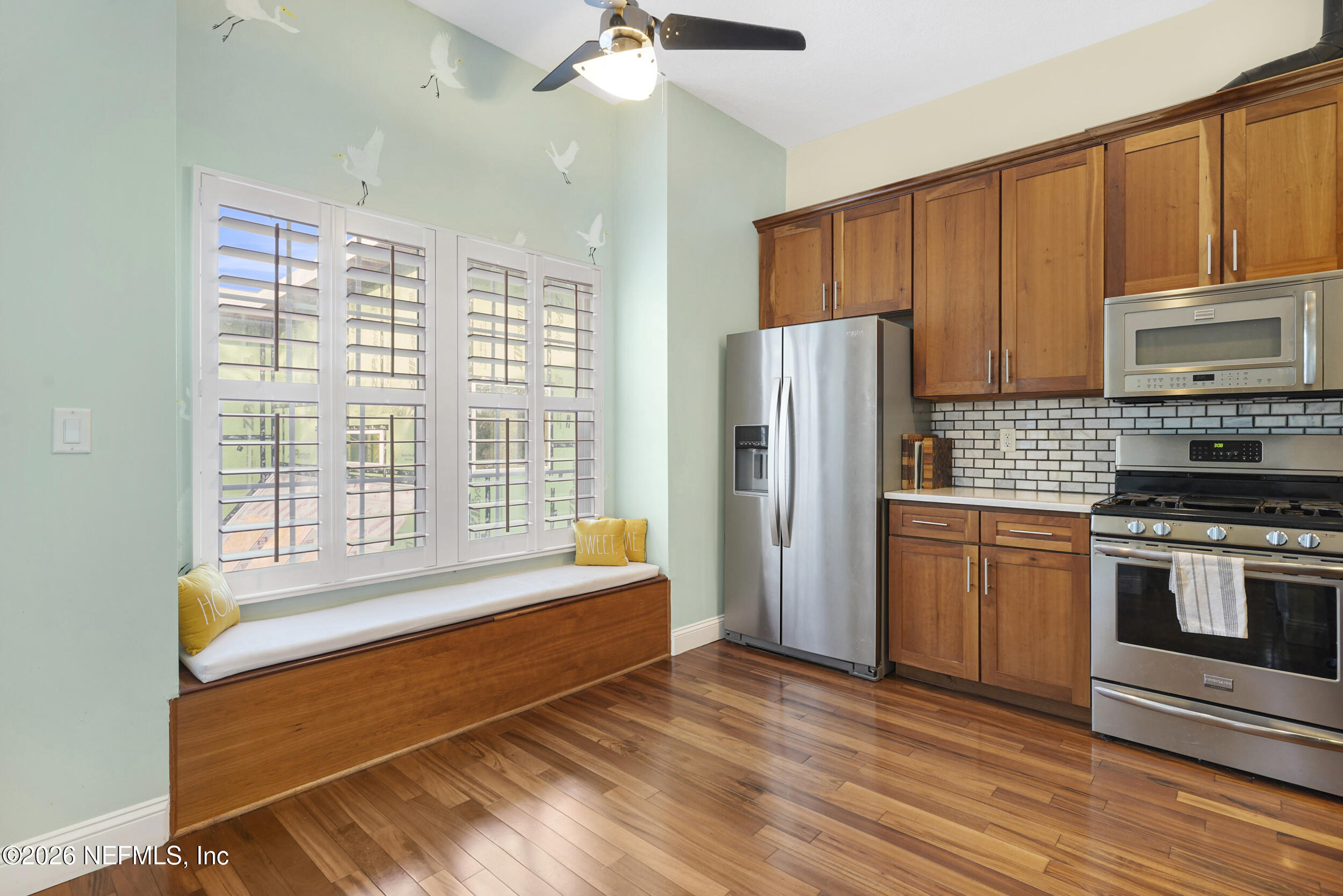 3336 Carmel Road St. Augustine, FL 32086 - Photo 11 of 55 a kitchen with stainless steel appliances granite countertop a refrigerator and a stove top oven
