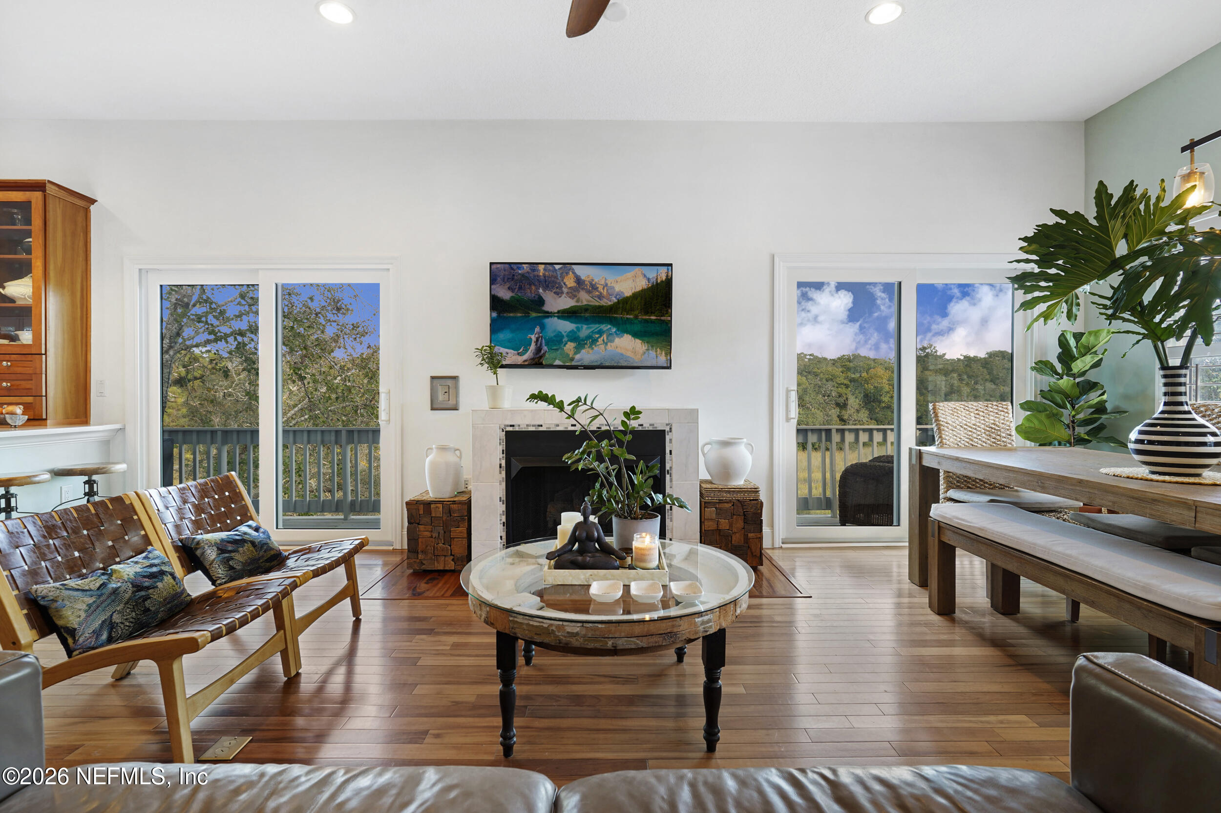 3336 Carmel Road St. Augustine, FL 32086 - Photo 16 of 55 a living room with fireplace furniture and a flat screen tv