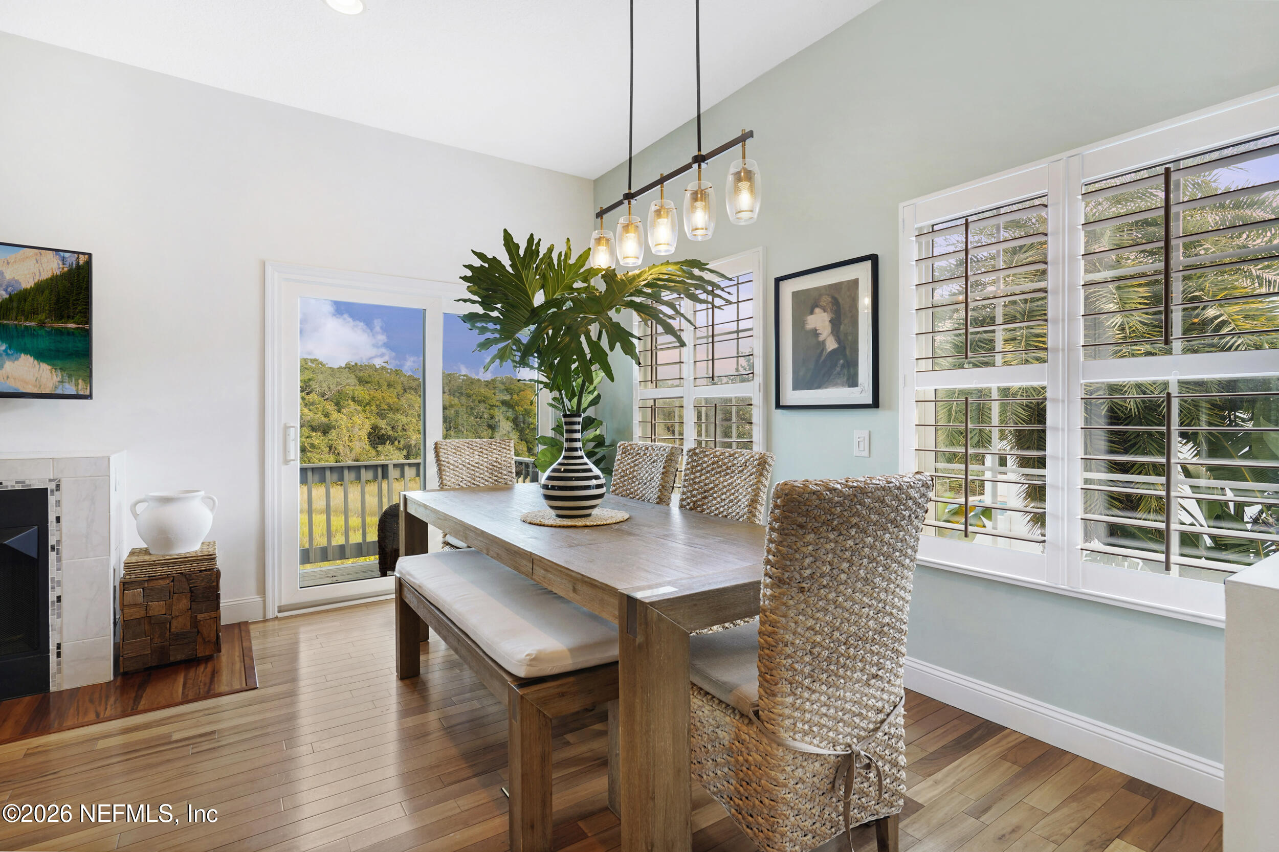 3336 Carmel Road St. Augustine, FL 32086 - Photo 17 of 55 a view of a dining room with furniture window and wooden floor