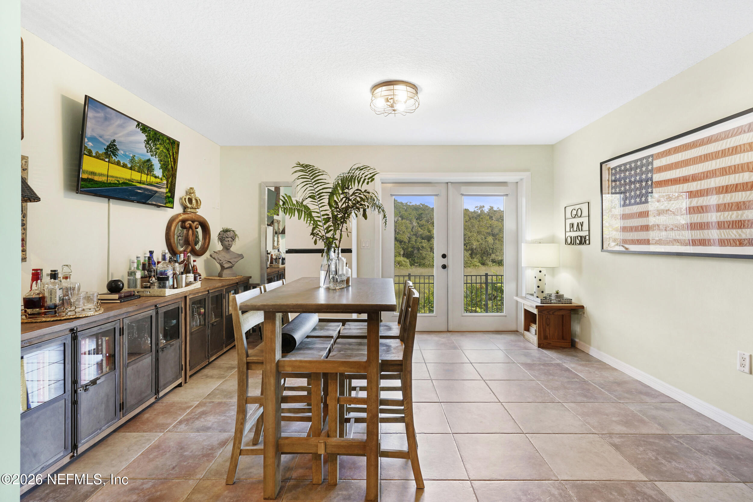 3336 Carmel Road St. Augustine, FL 32086 - Photo 35 of 55 a view of a workspace with furniture and a window