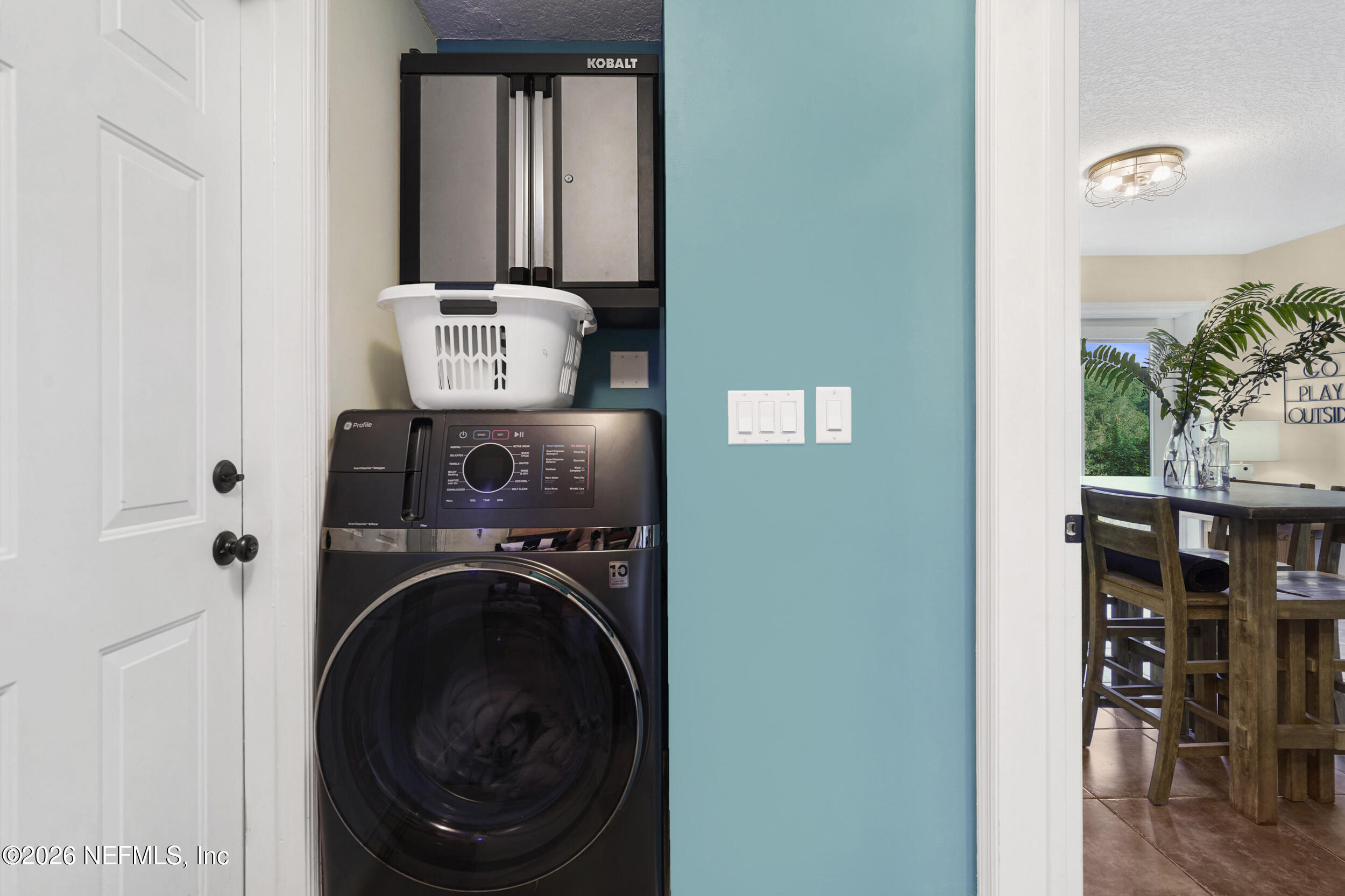 3336 Carmel Road St. Augustine, FL 32086 - Photo 36 of 55 a view of storage and utility room with washer and dryer