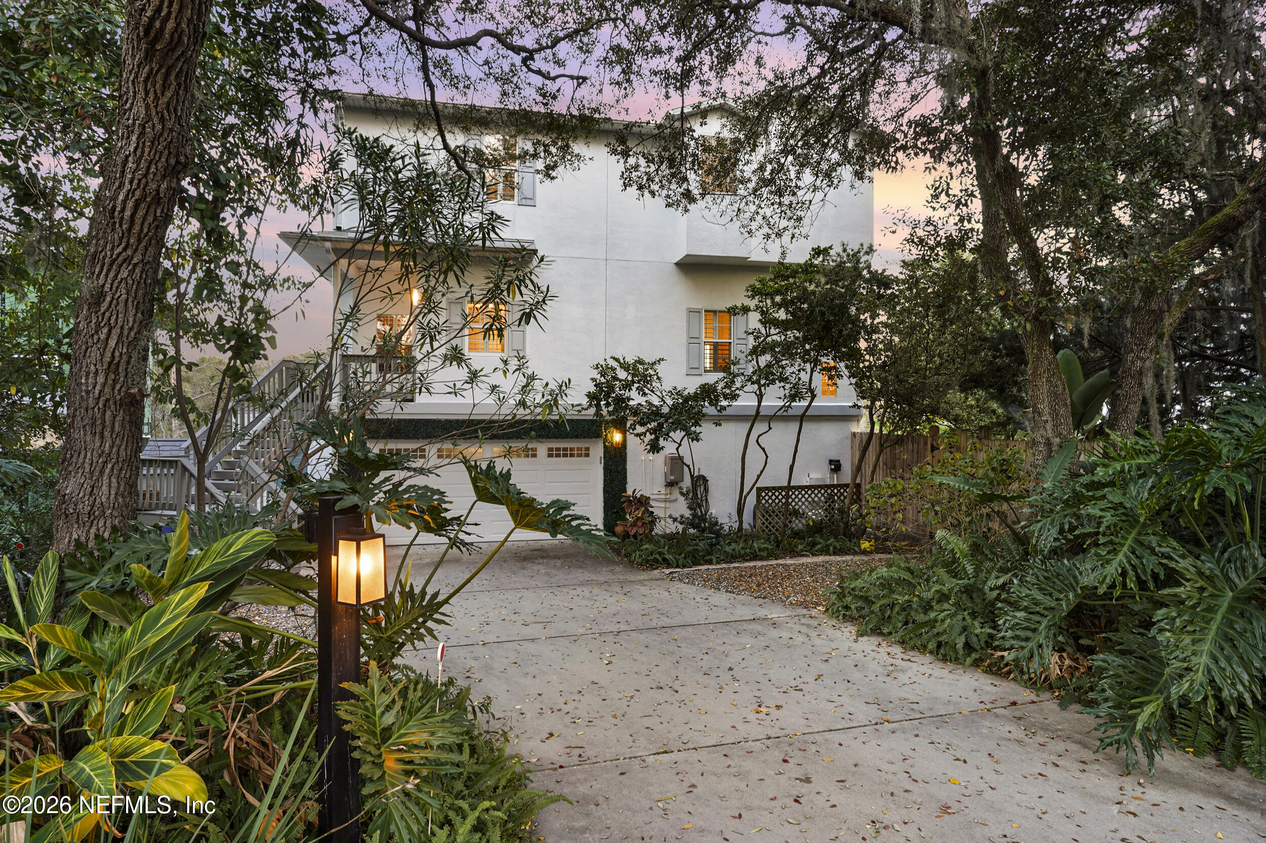 3336 Carmel Road St. Augustine, FL 32086 - Photo 4 of 55 a view of a bench in backyard of a house