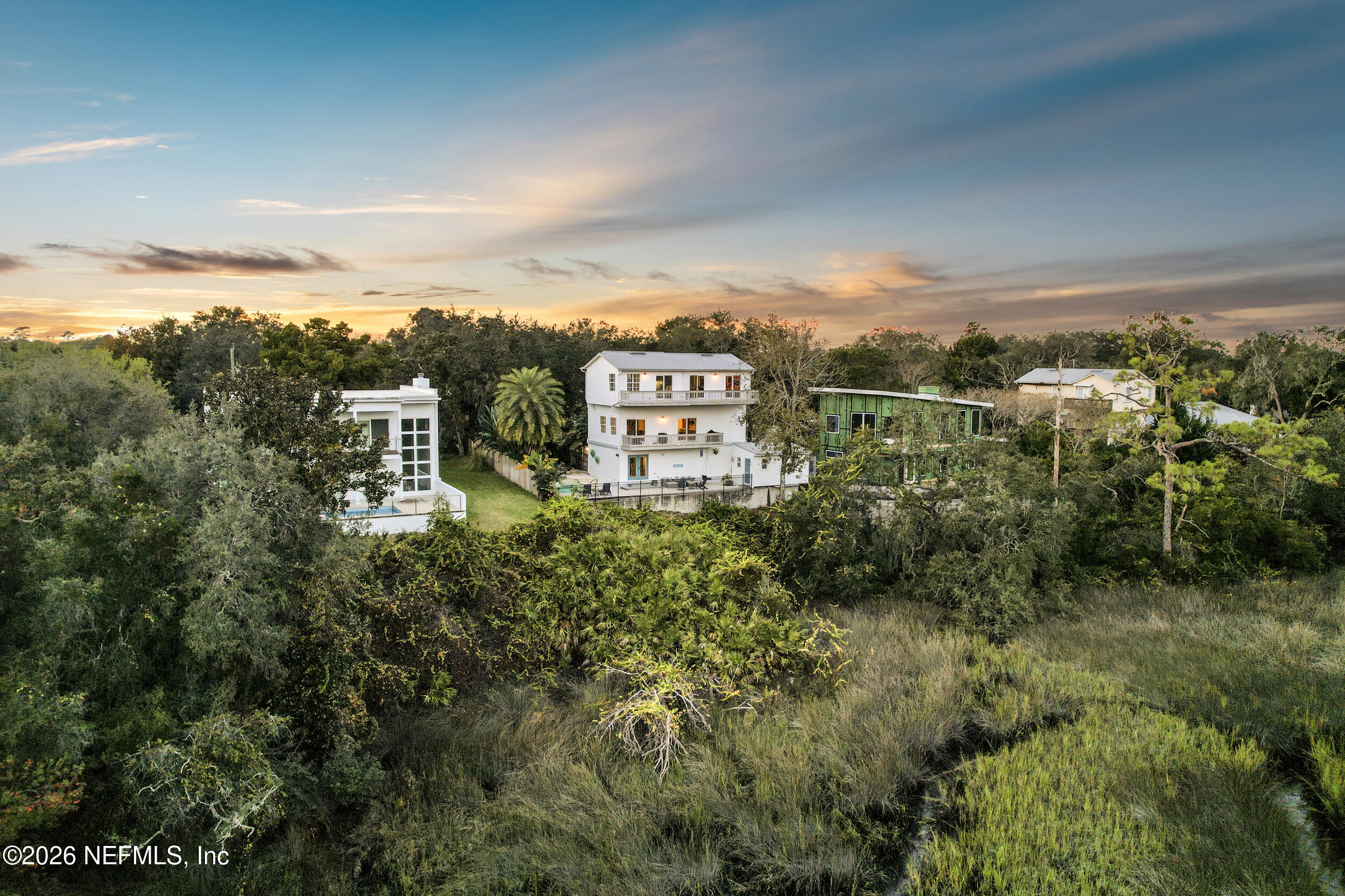 3336 Carmel Road St. Augustine, FL 32086 - Photo 53 of 55 a view of a city with lush green forest