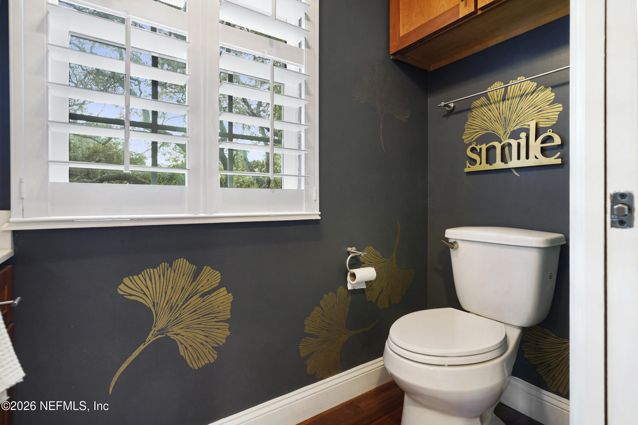 3336 Carmel Road St. Augustine, FL 32086 - Photo 8 of 55 a white toilet sitting next to a window