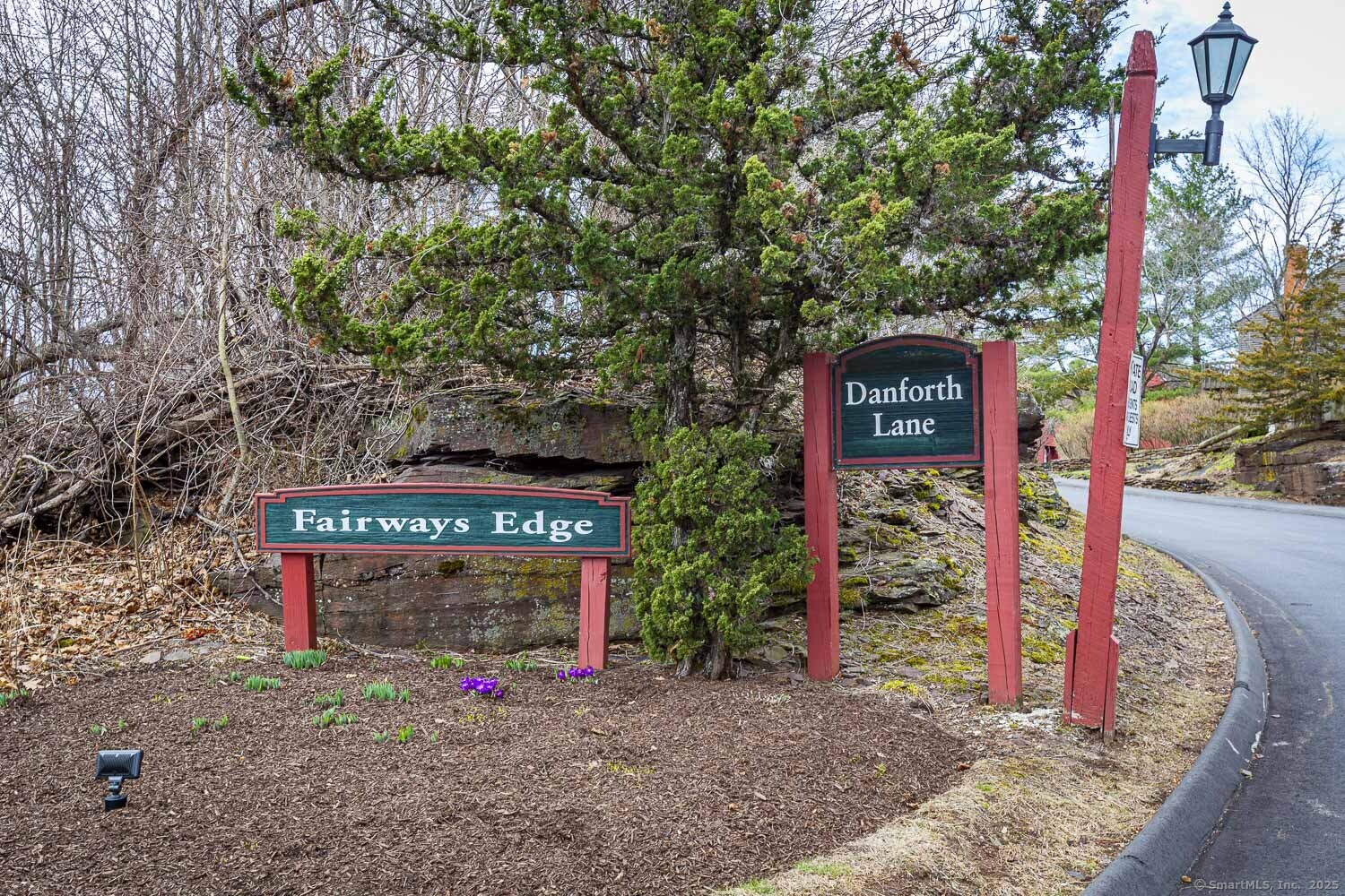 a sign that is on the side of the road