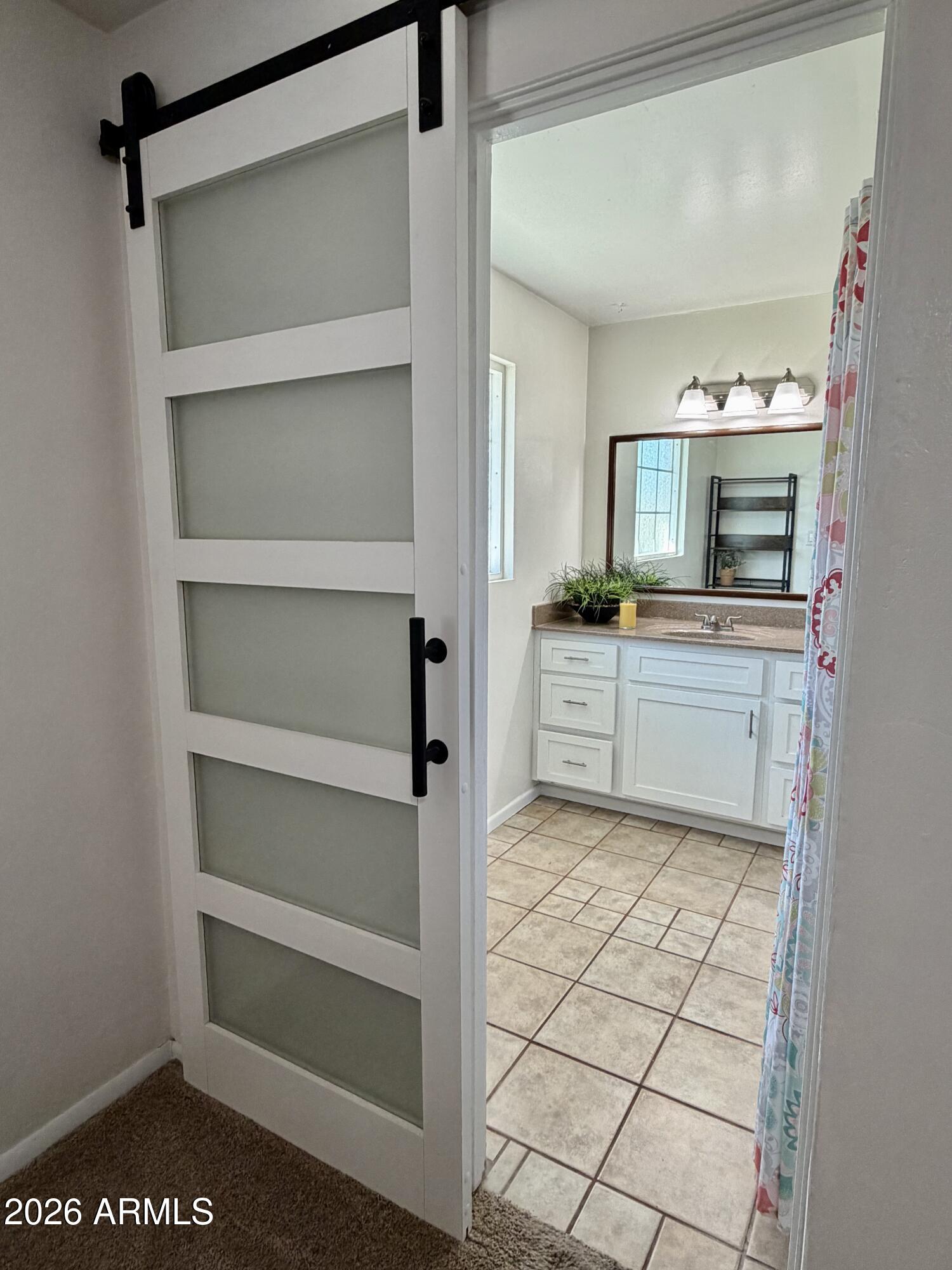 543 West 18th Street Tempe, AZ 85281 - Photo 11 of 29 a kitchen with granite countertop a cabinets and appliances
