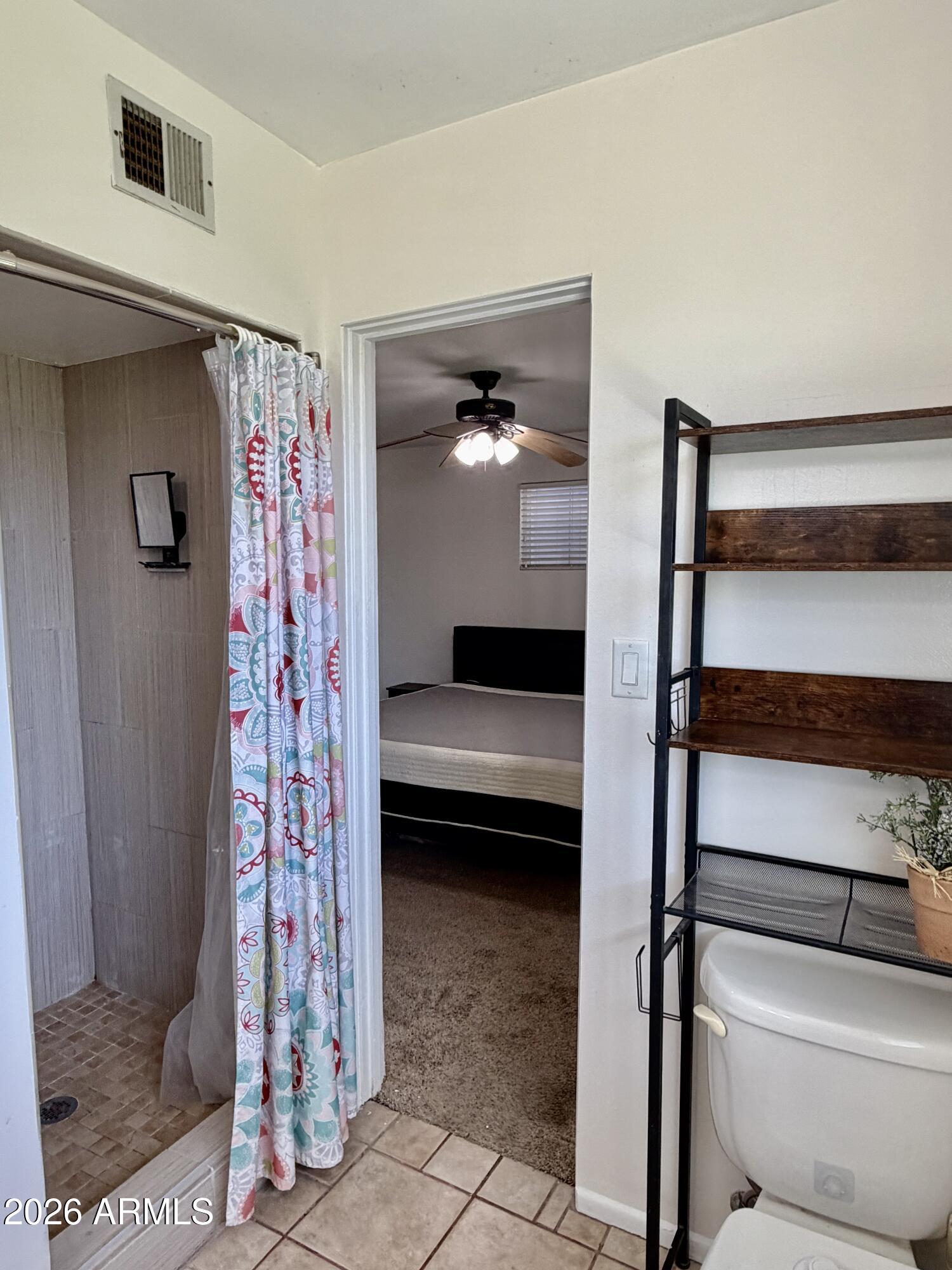 543 West 18th Street Tempe, AZ 85281 - Photo 14 of 29 a view of bedroom with a bed and a window