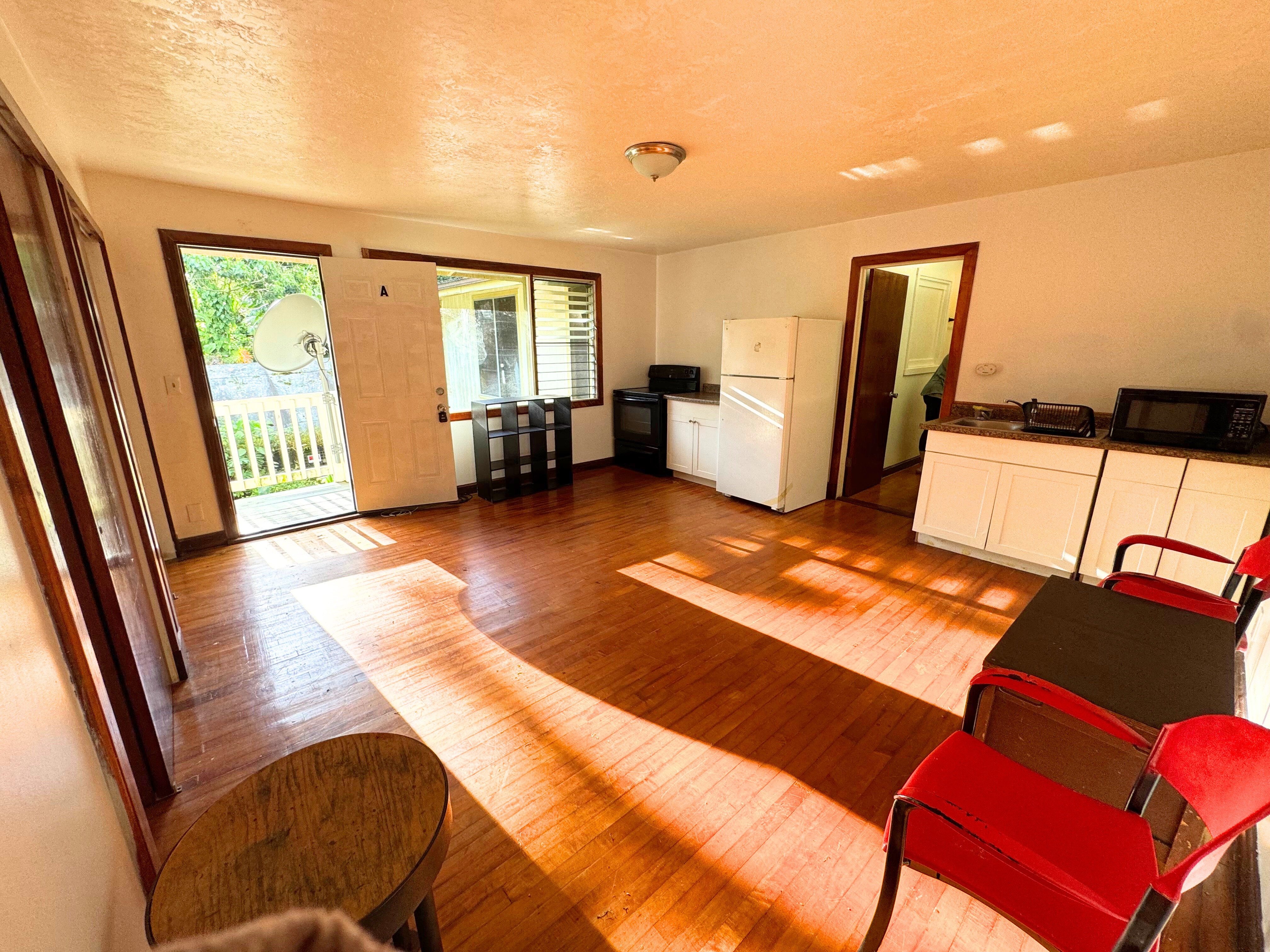 15-1485 Post Road Pahoa, HI 96778 - Photo 12 of 18 a view of a living room with furniture and a rug