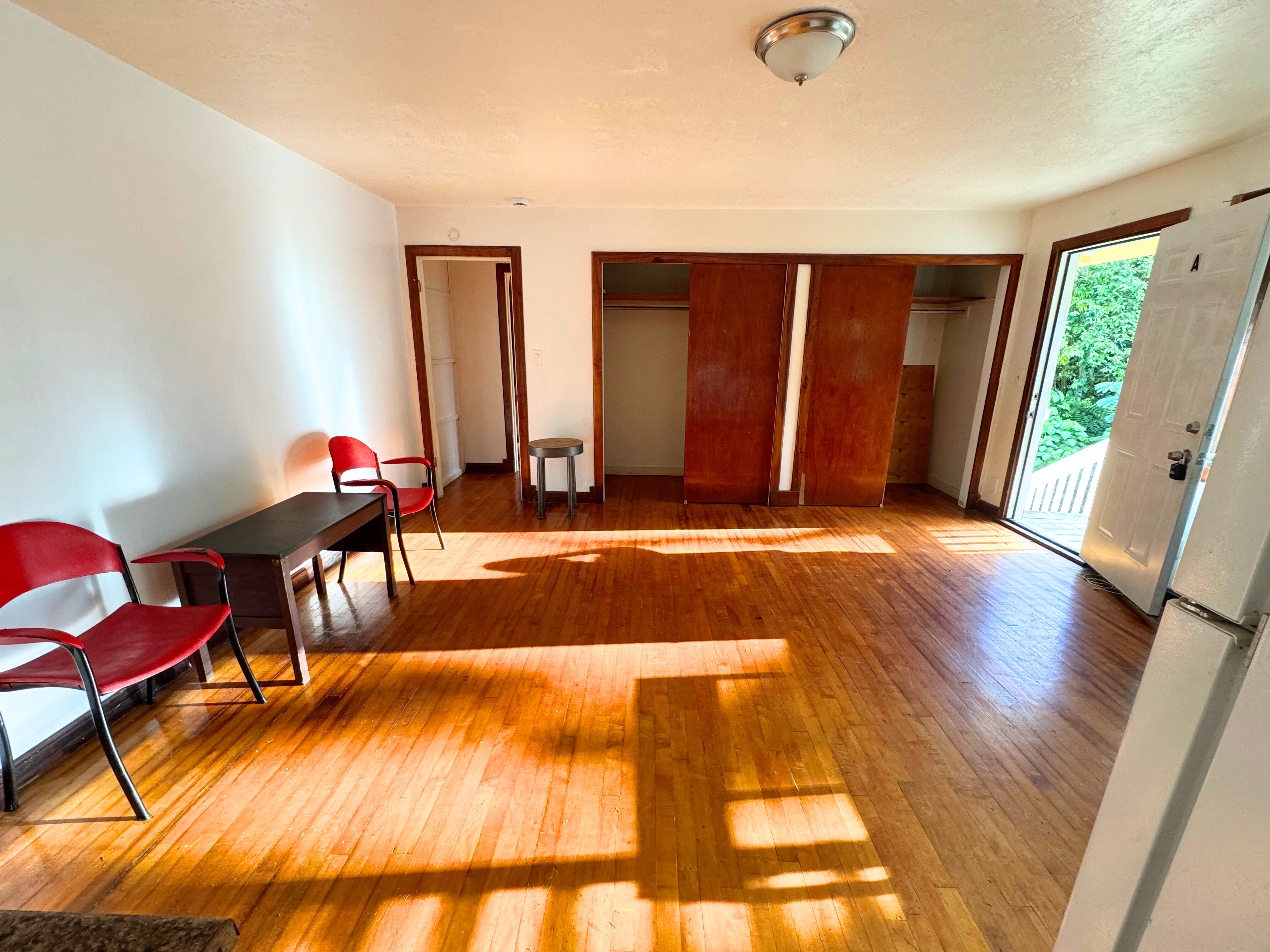 15-1485 Post Road Pahoa, HI 96778 - Photo 14 of 18 a living room with furniture and wooden floor