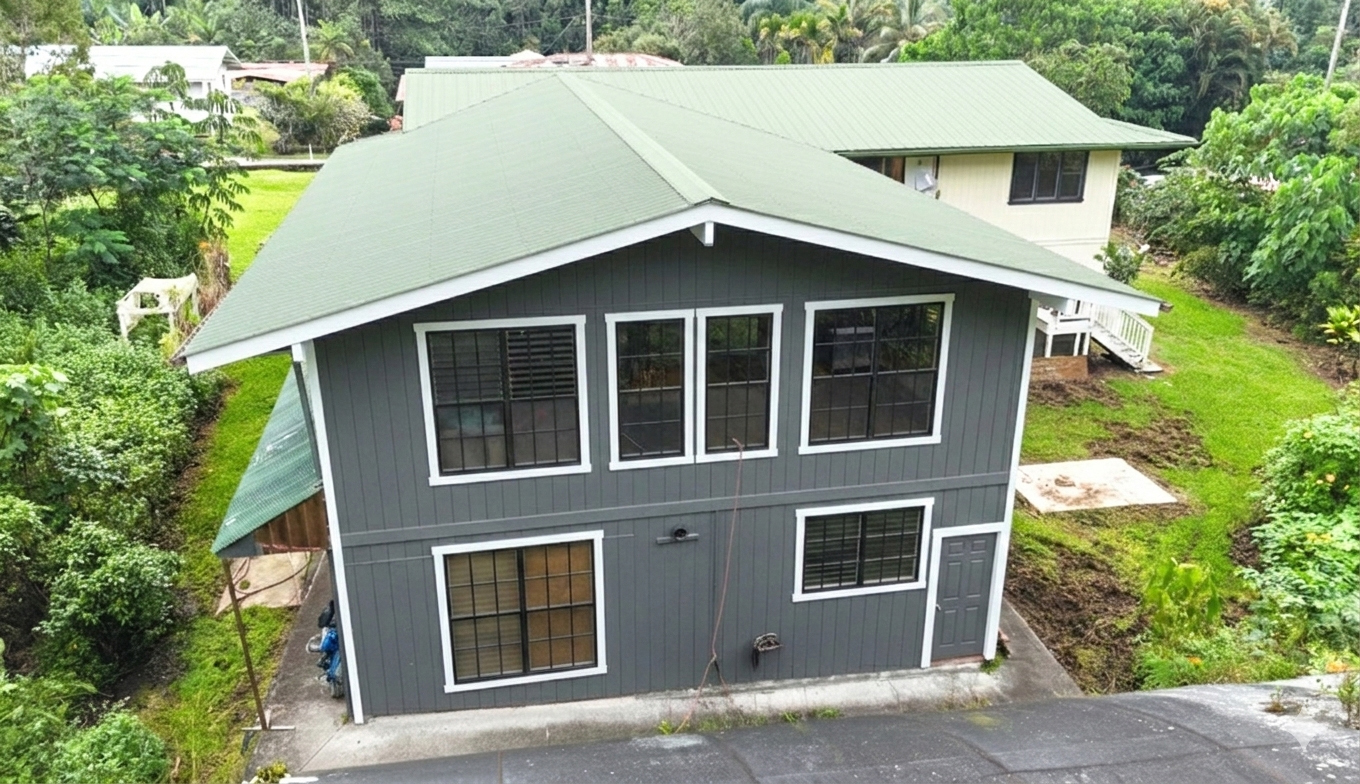 15-1485 Post Road Pahoa, HI 96778 - Photo 17 of 18 a front view of a house with a yard and garage