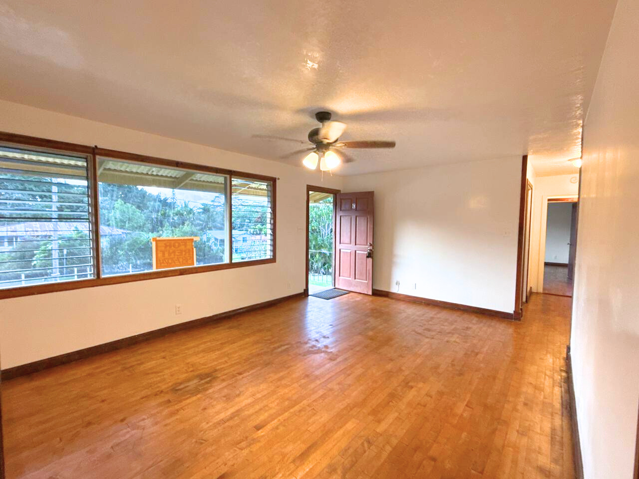 15-1485 Post Road Pahoa, HI 96778 - Photo 4 of 18 wooden floor in an empty room with a window