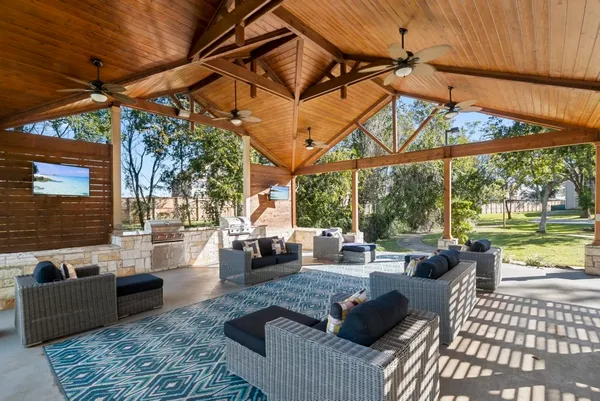 a bedroom with a bed and a potted plant