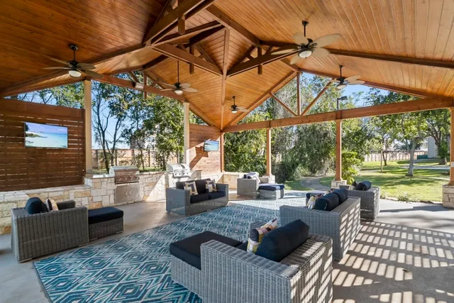 a bedroom with a bed and a potted plant