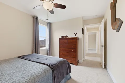 a bedroom with a bed and furniture