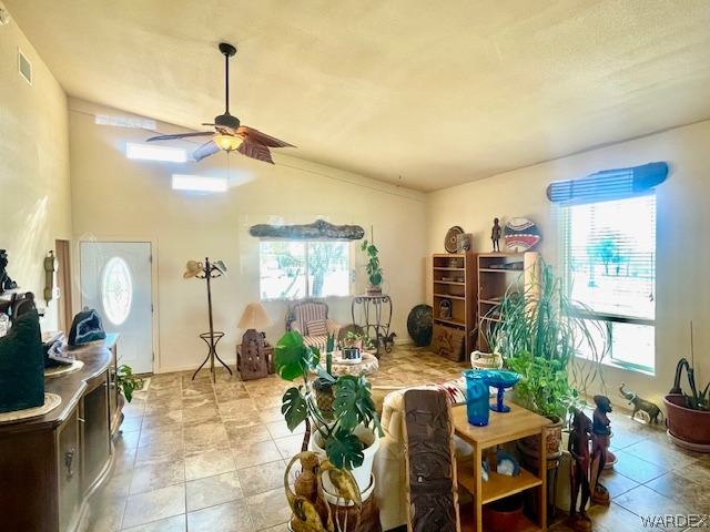 21477 South Sundance Kid Road Yucca, AZ 86438 - Photo 14 of 66 a view of a livingroom with furniture window and wooden floor