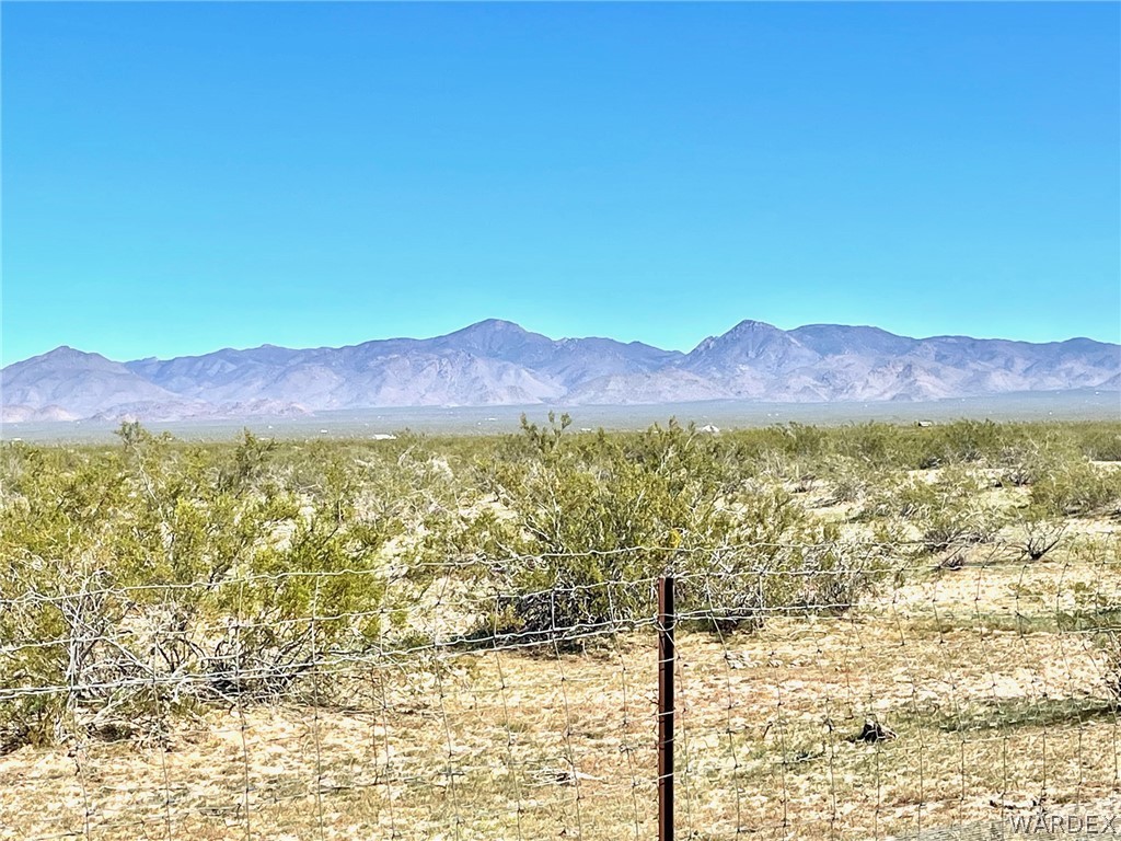 21477 South Sundance Kid Road Yucca, AZ 86438 - Photo 48 of 66 a view of an outdoor space with mountain view