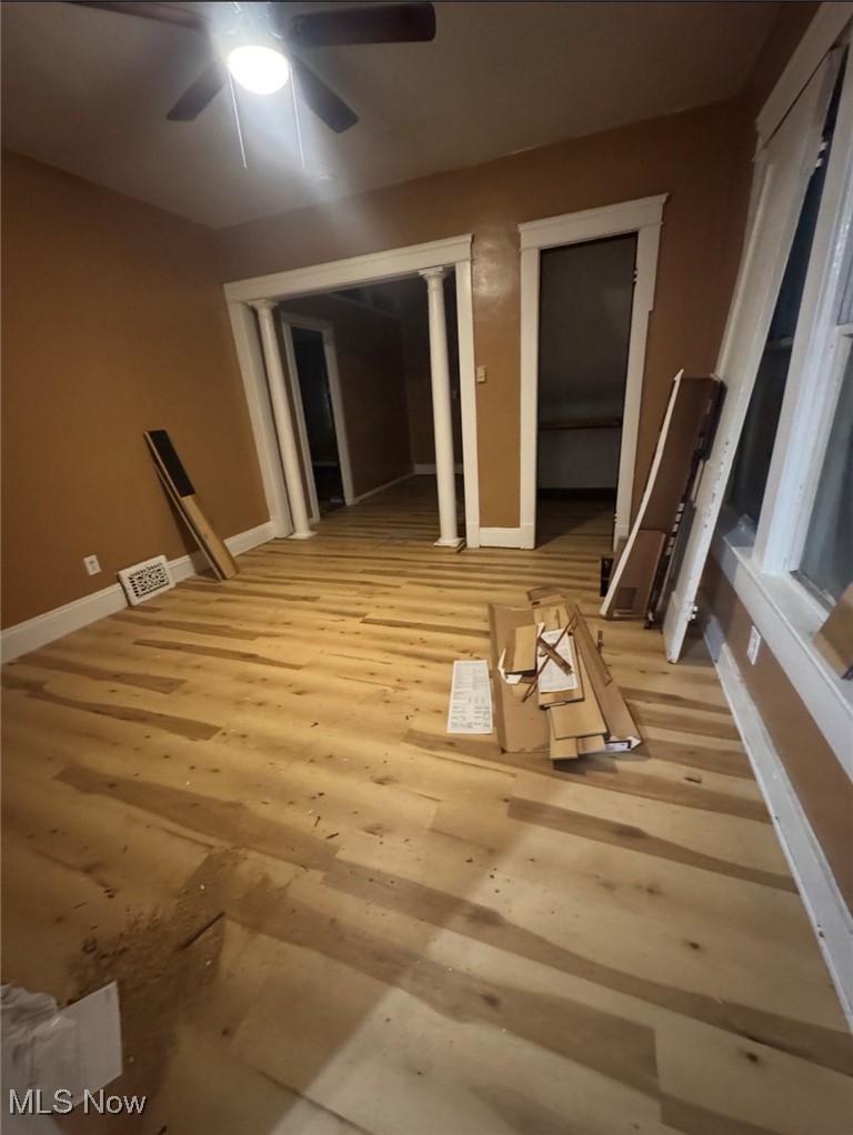 12406 Kinsman Road Cleveland, OH 44120 - Photo 7 of 29 Empty room featuring light wood-style floors and ceiling fan