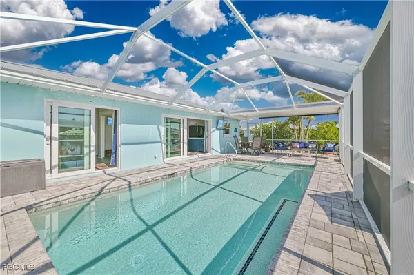 a view of a house with a swimming pool